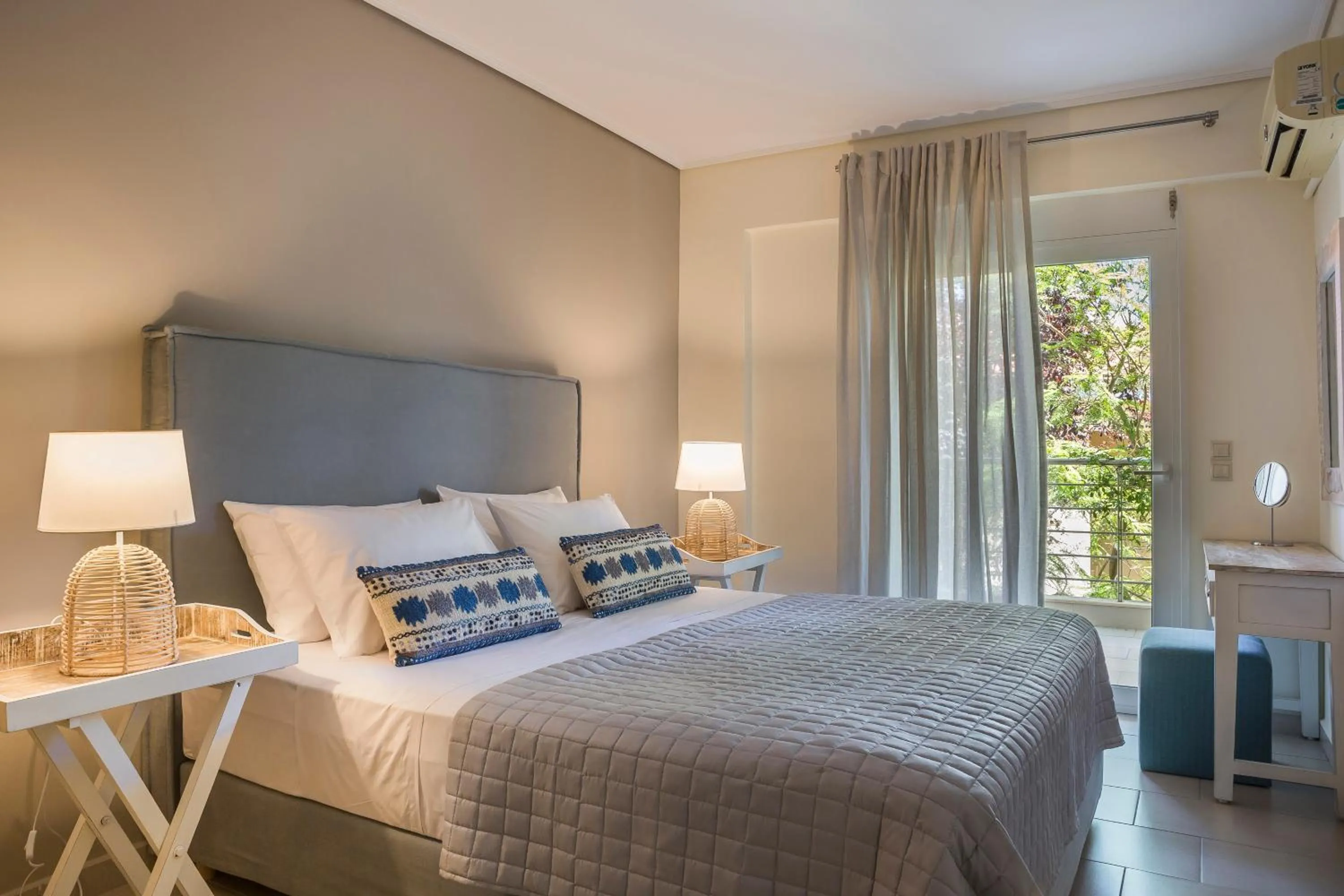 Bed in Meliti Waterfront Suites