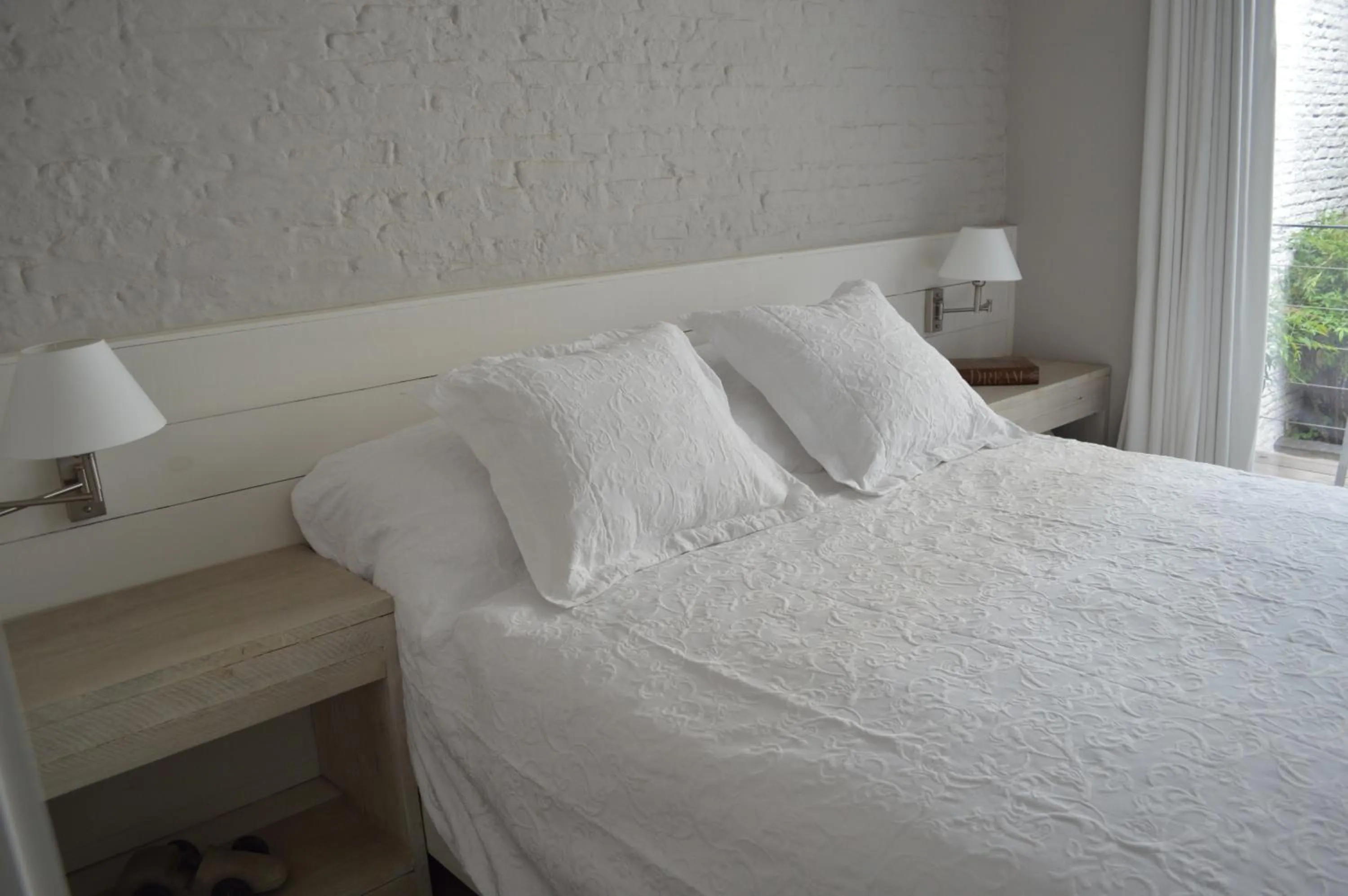 Bed in De Waterzooi Lodge