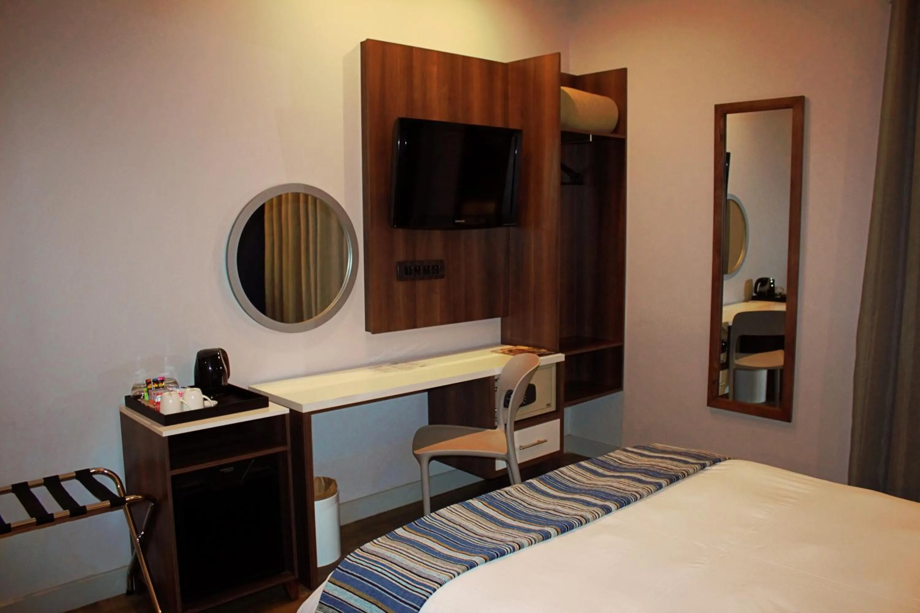 Bed in aha Kathu Hotel