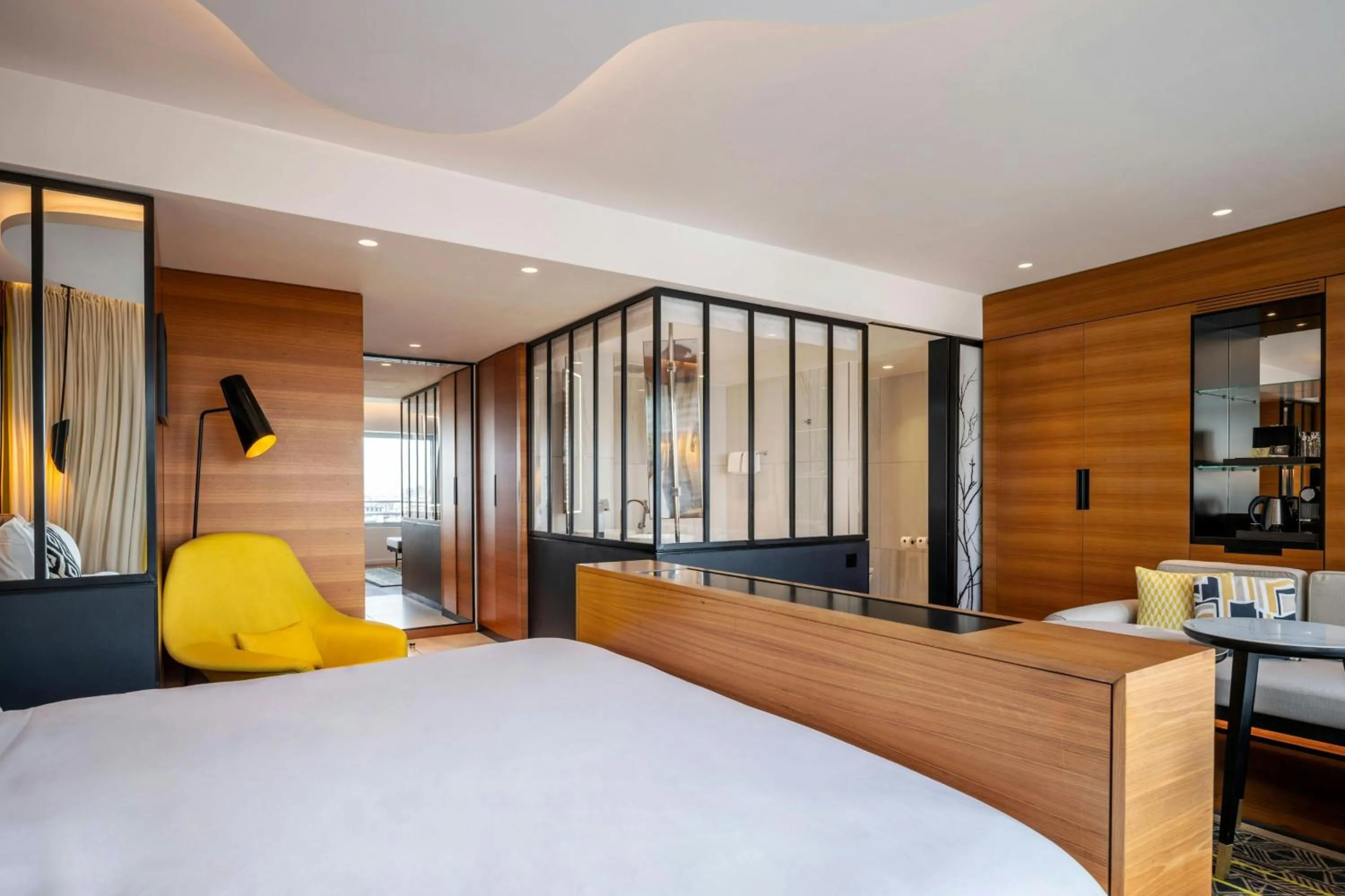 Bathroom, Bed in Renaissance Paris Republique Hotel & Spa