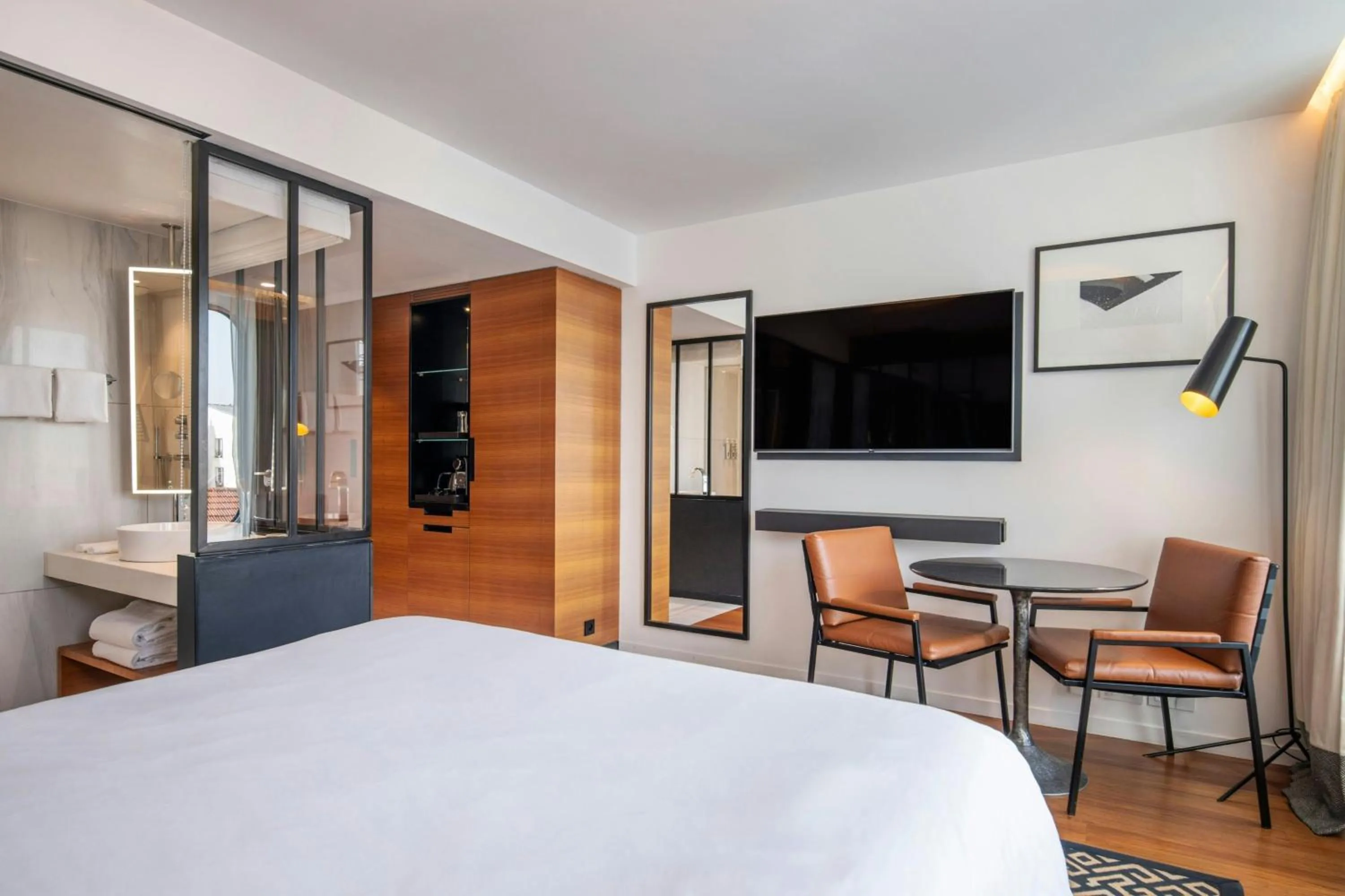 Bathroom, Bed in Renaissance Paris Republique Hotel & Spa