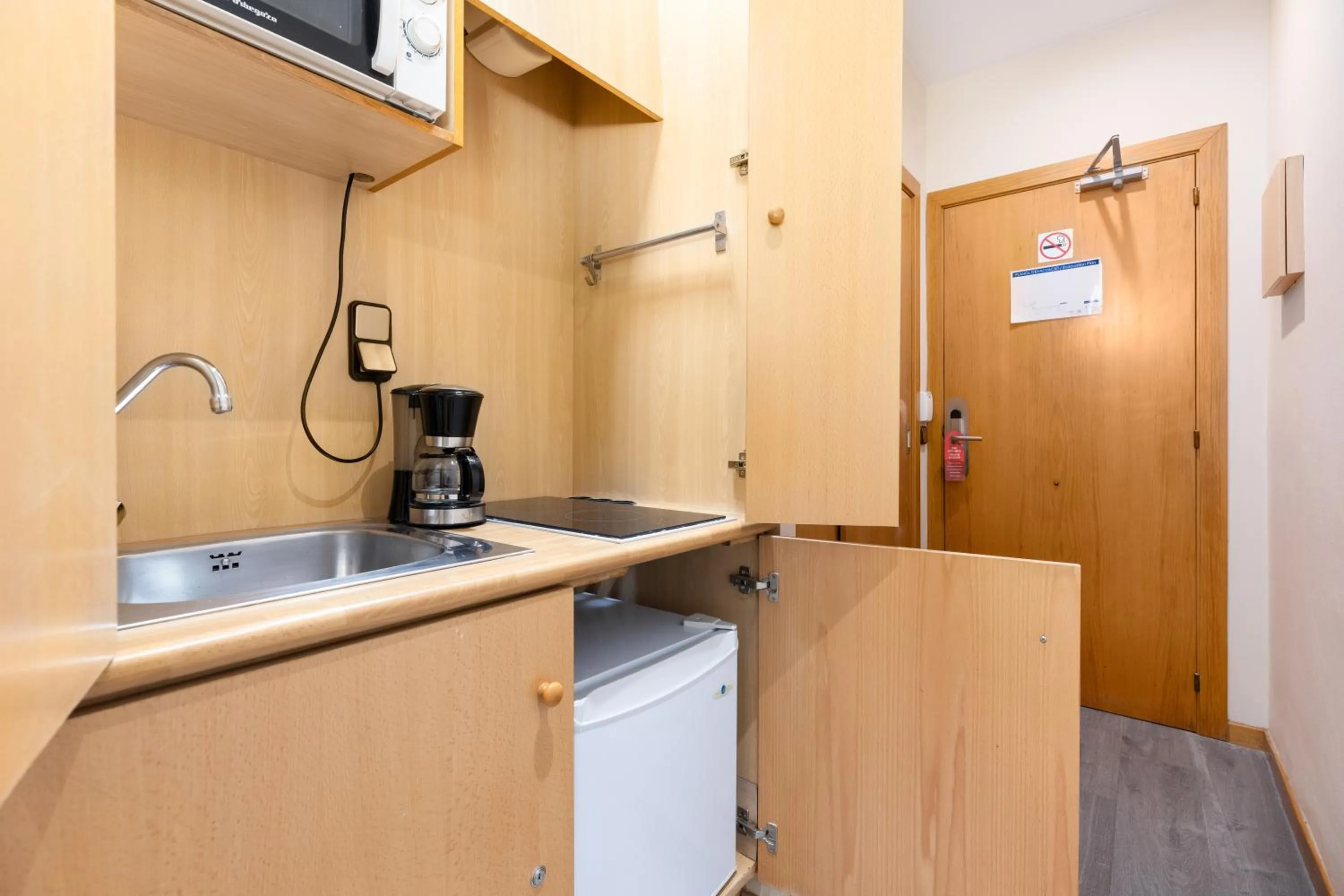 Kitchen or kitchenette in Apartamentos DV