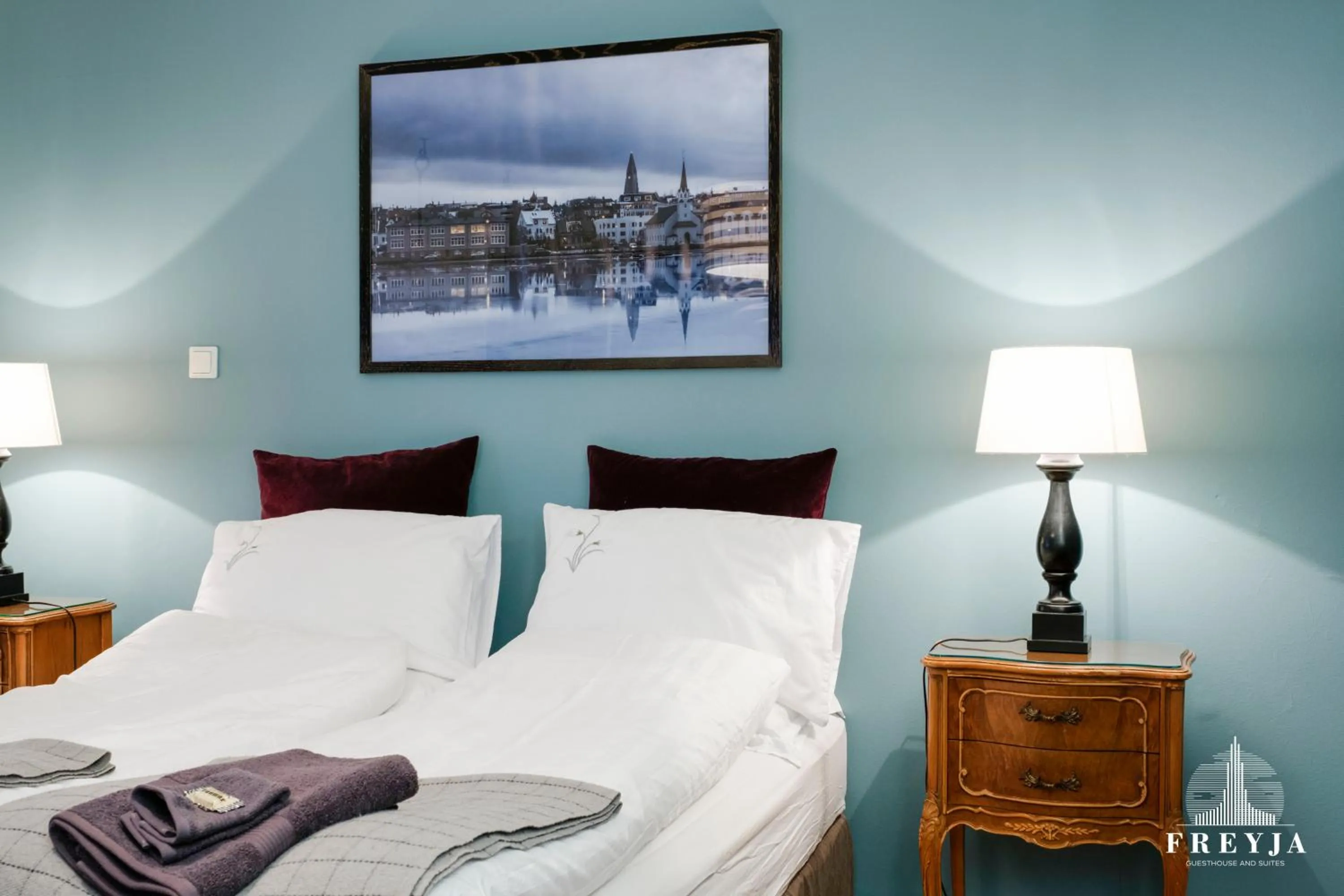 Bed in Freyja Guesthouse & Suites