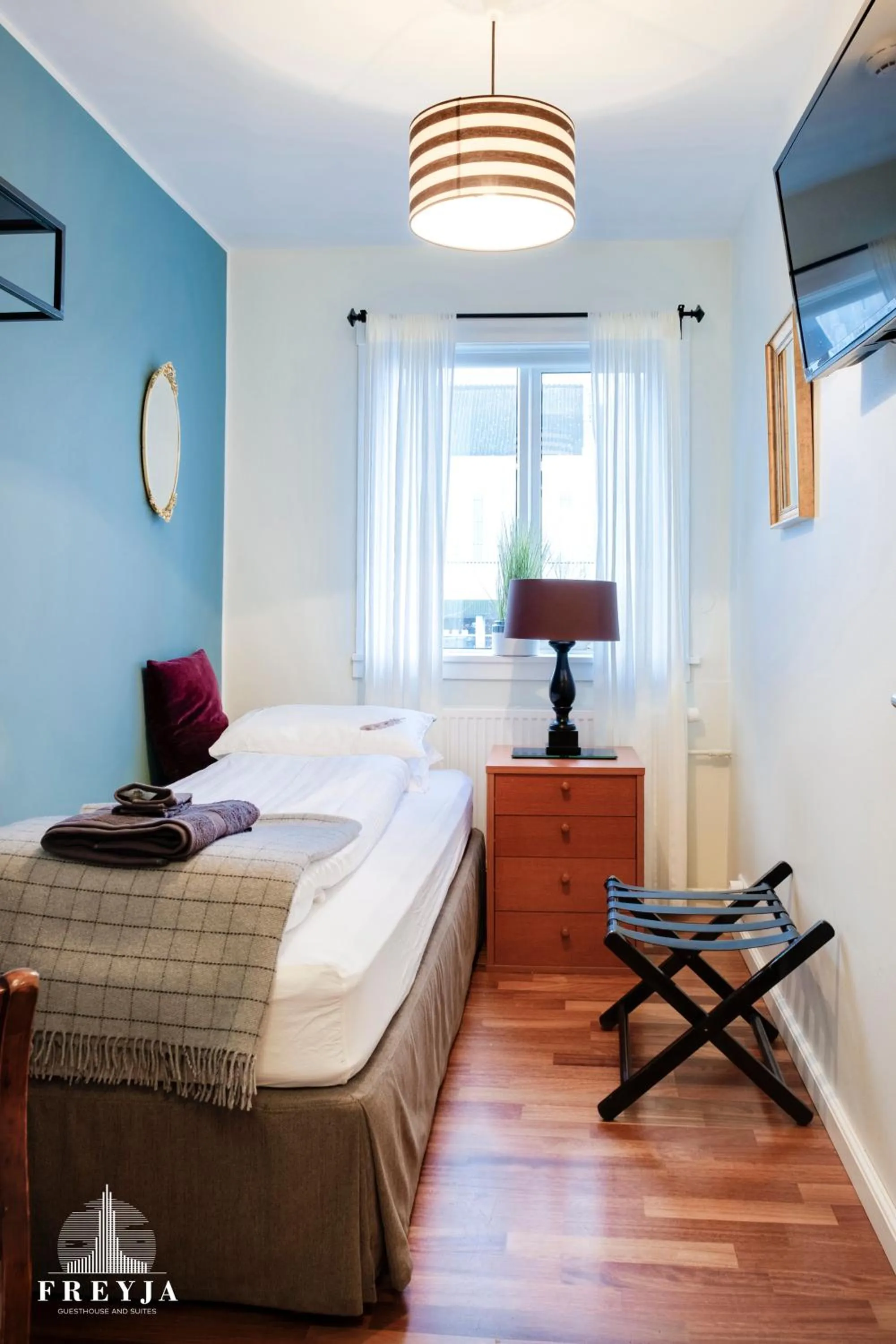 Bed in Freyja Guesthouse & Suites