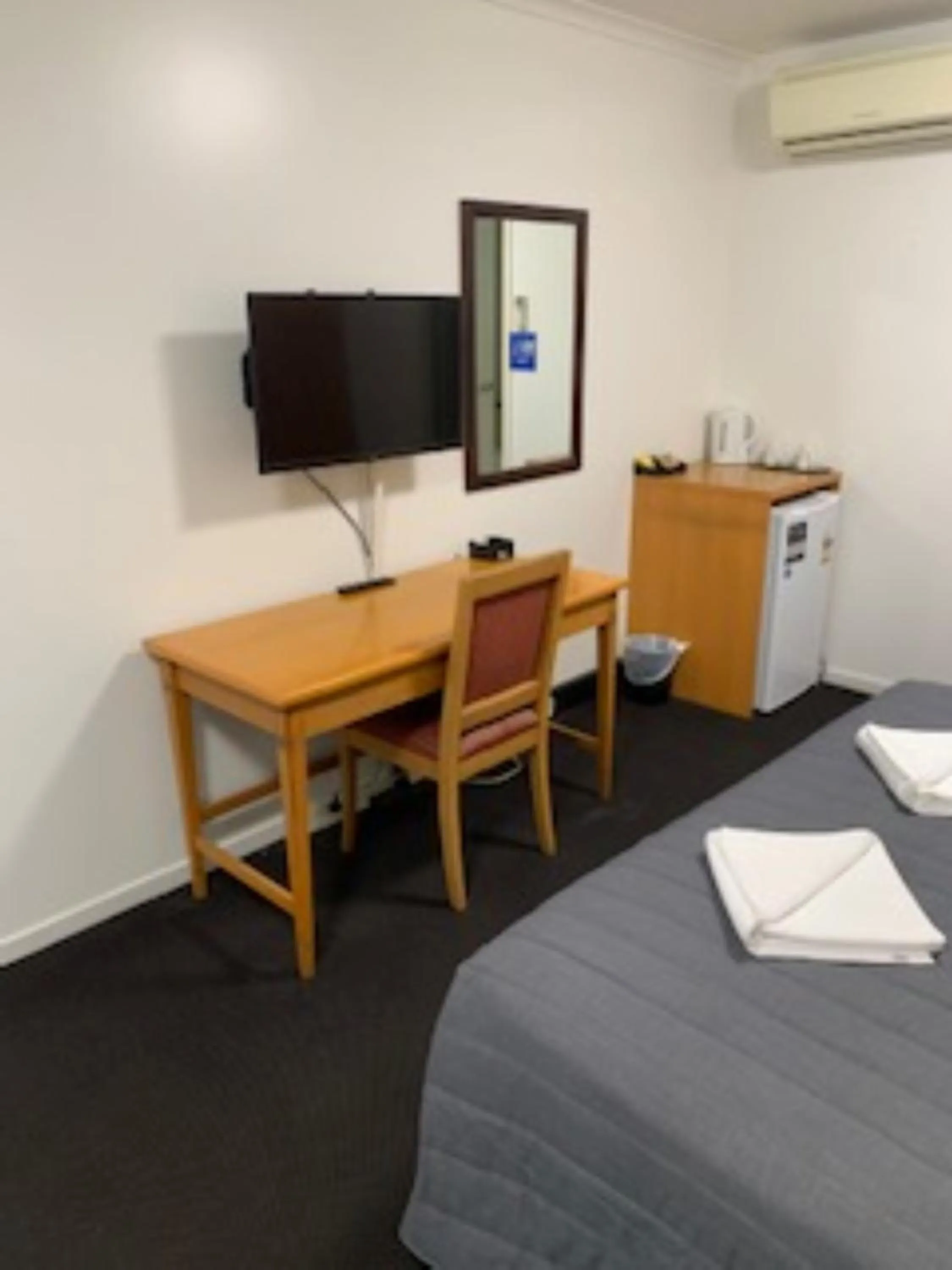 Bed in Queensport Tavern And Motel