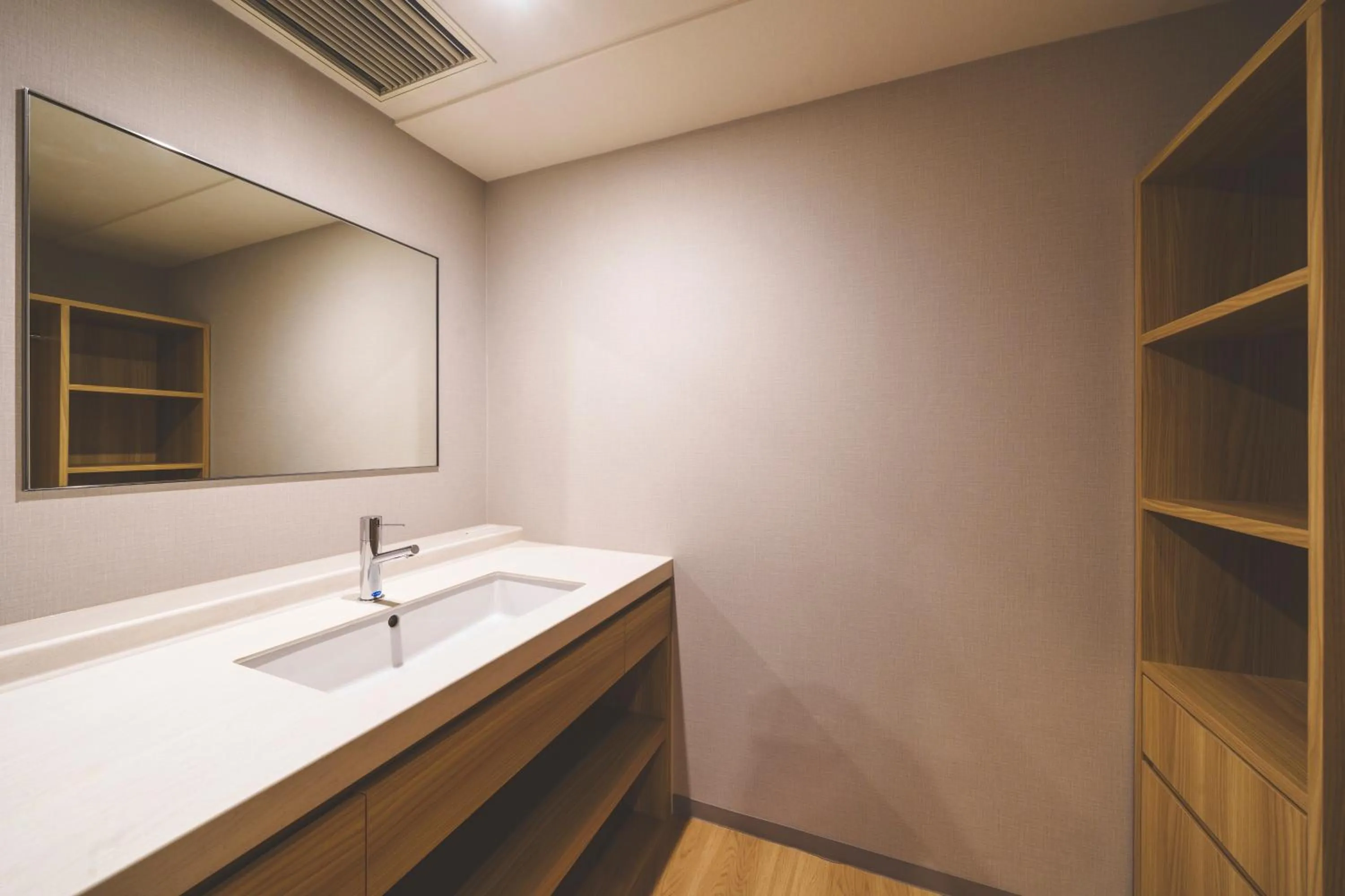 Photo of the whole room in 琉球オリオンホテル 那覇国際通り