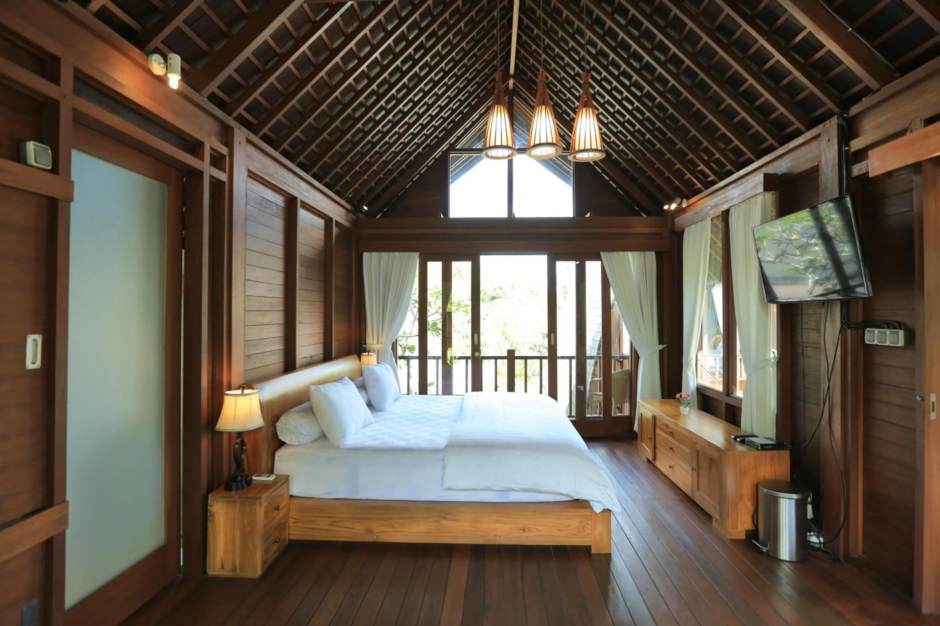 Bed in Raja Woods Villa