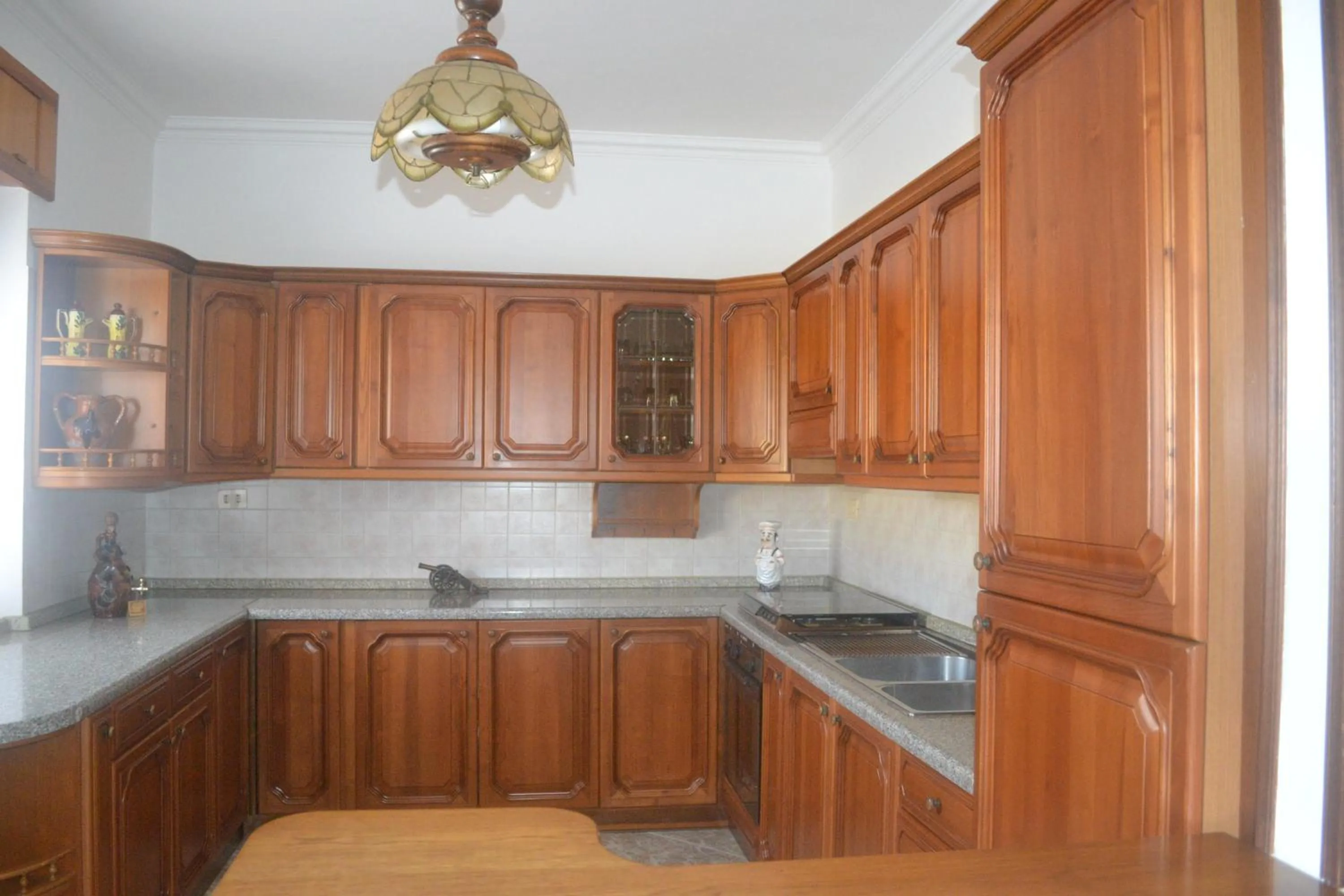 Communal kitchen in B&B Casa degli Ulivi