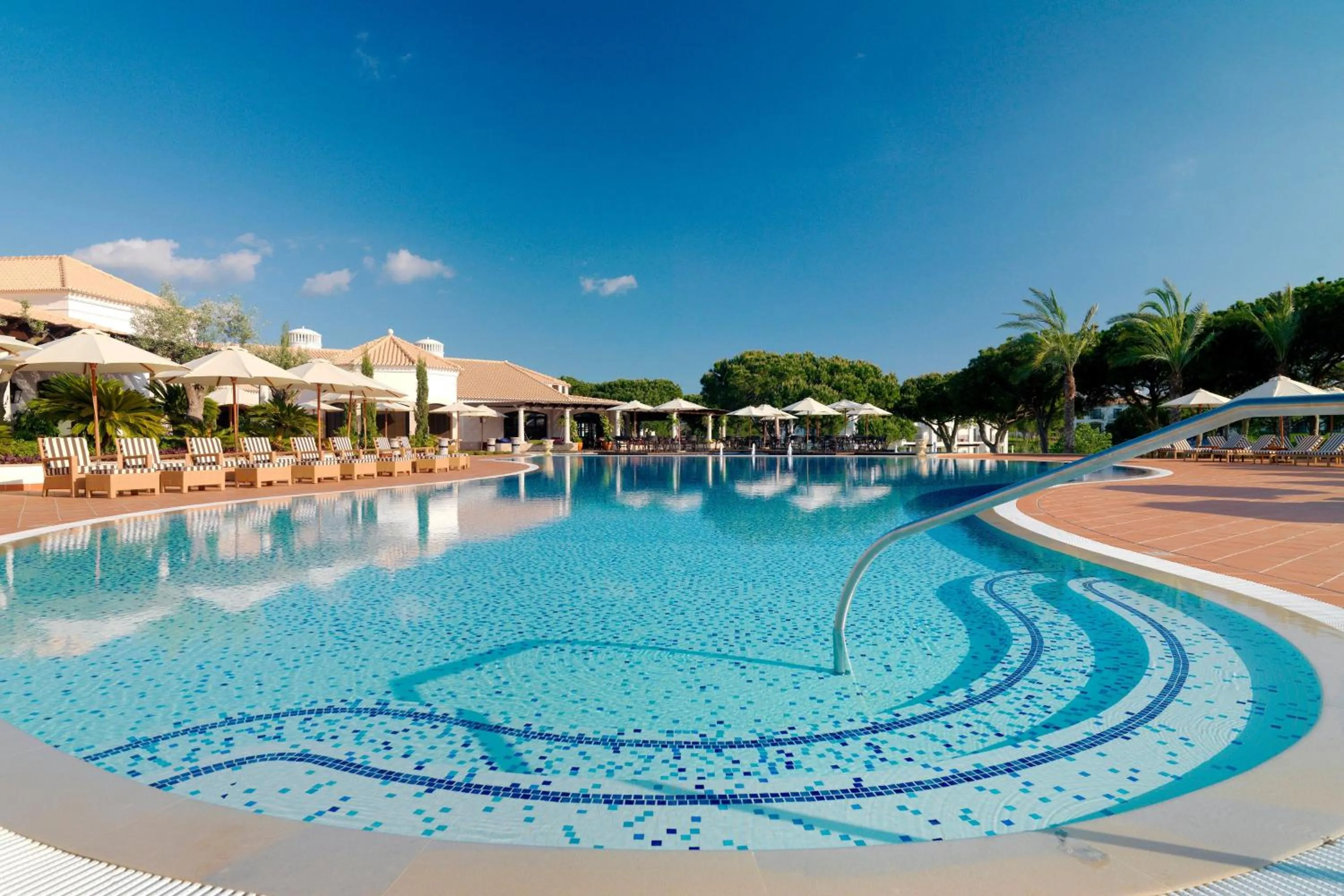 Swimming pool in Pine Cliffs Ocean Suites, a Luxury Collection Resort & Spa, Algarve