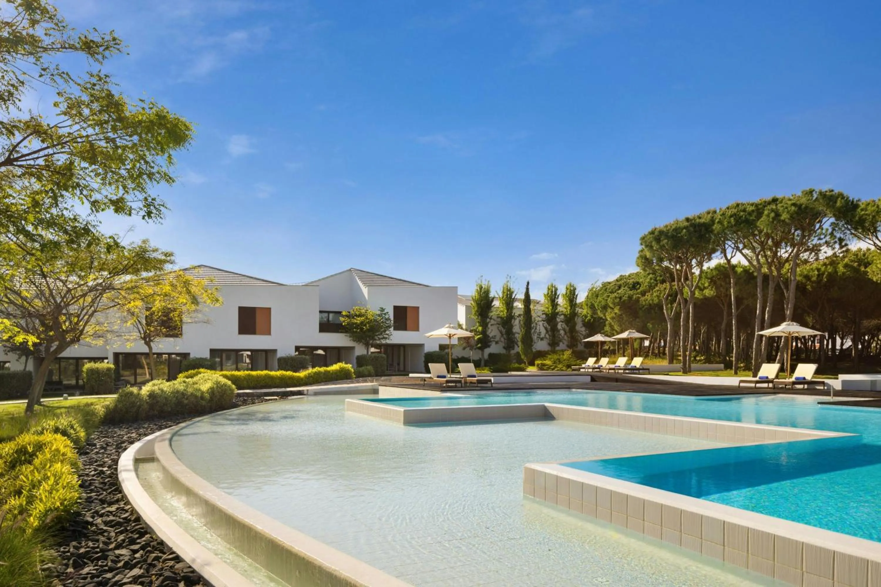 Swimming pool in Pine Cliffs Ocean Suites, a Luxury Collection Resort & Spa, Algarve