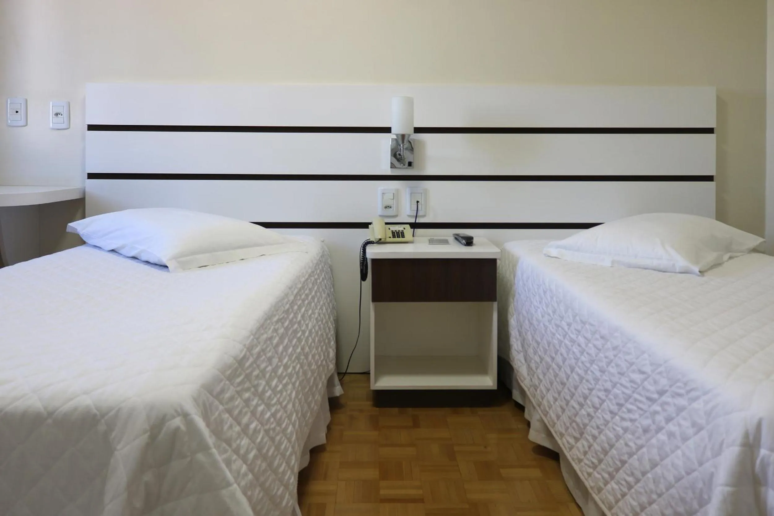 Bed in Tri Hotel Xanxerê