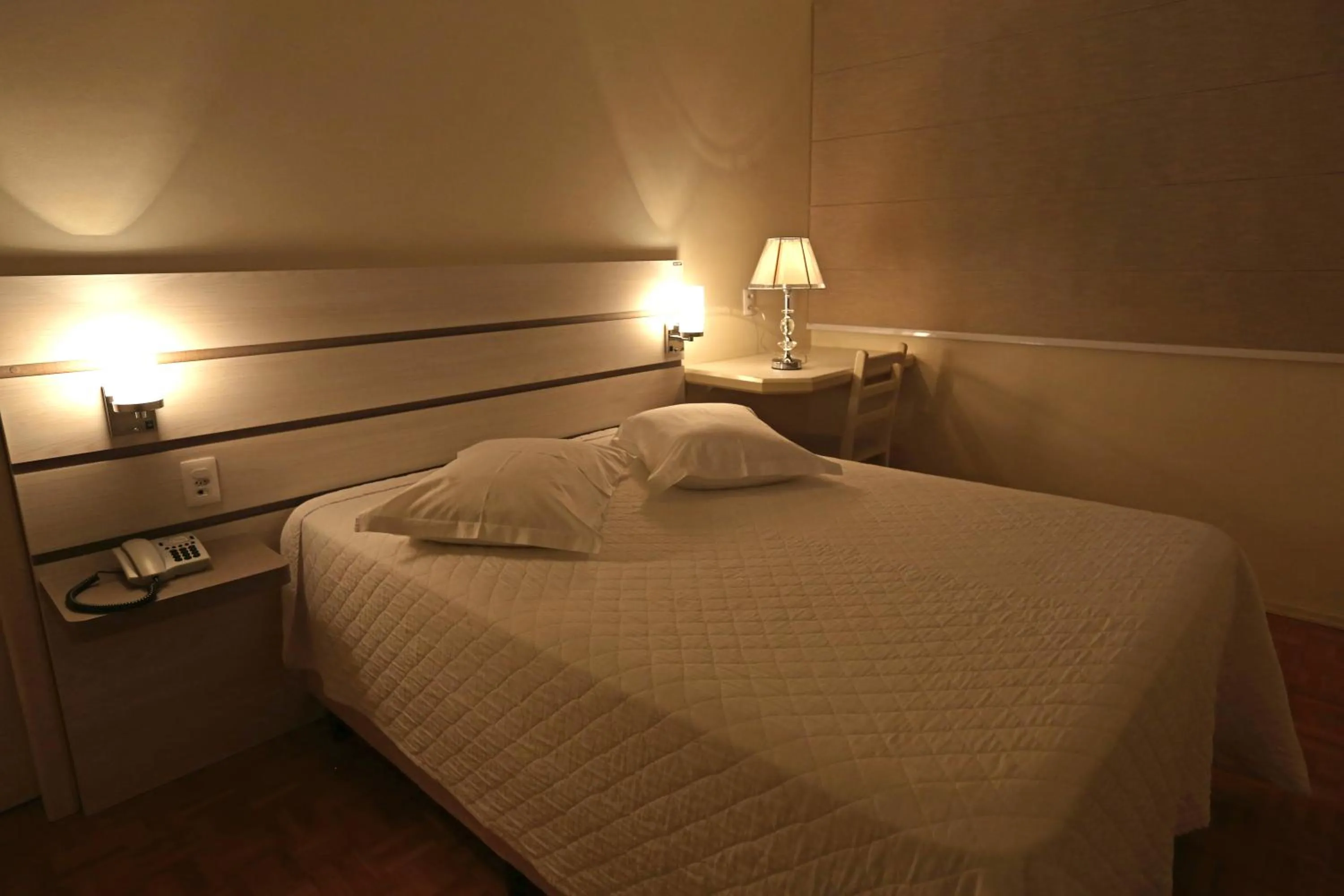 Bed in Tri Hotel Xanxerê