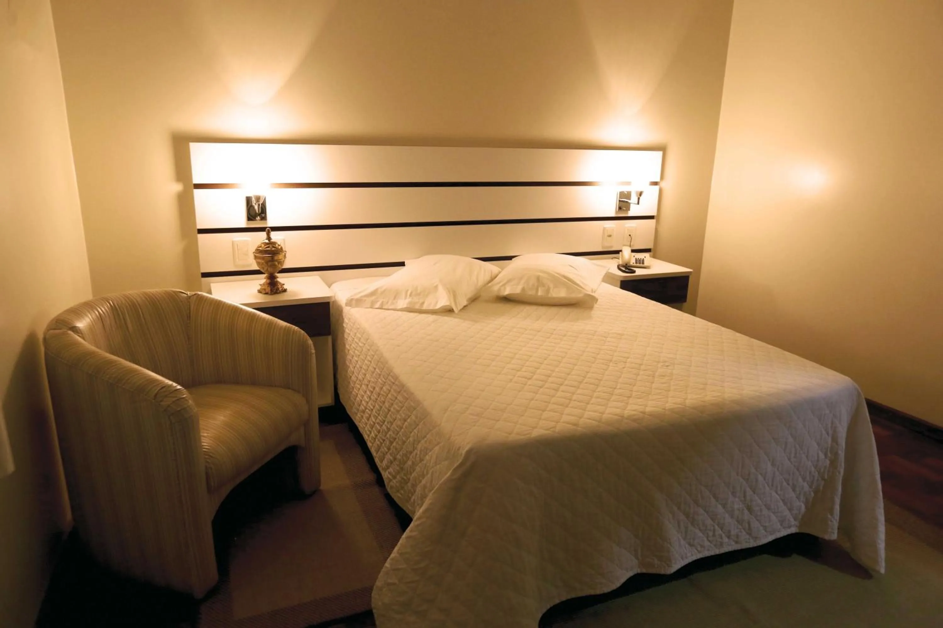 Bed in Tri Hotel Xanxerê