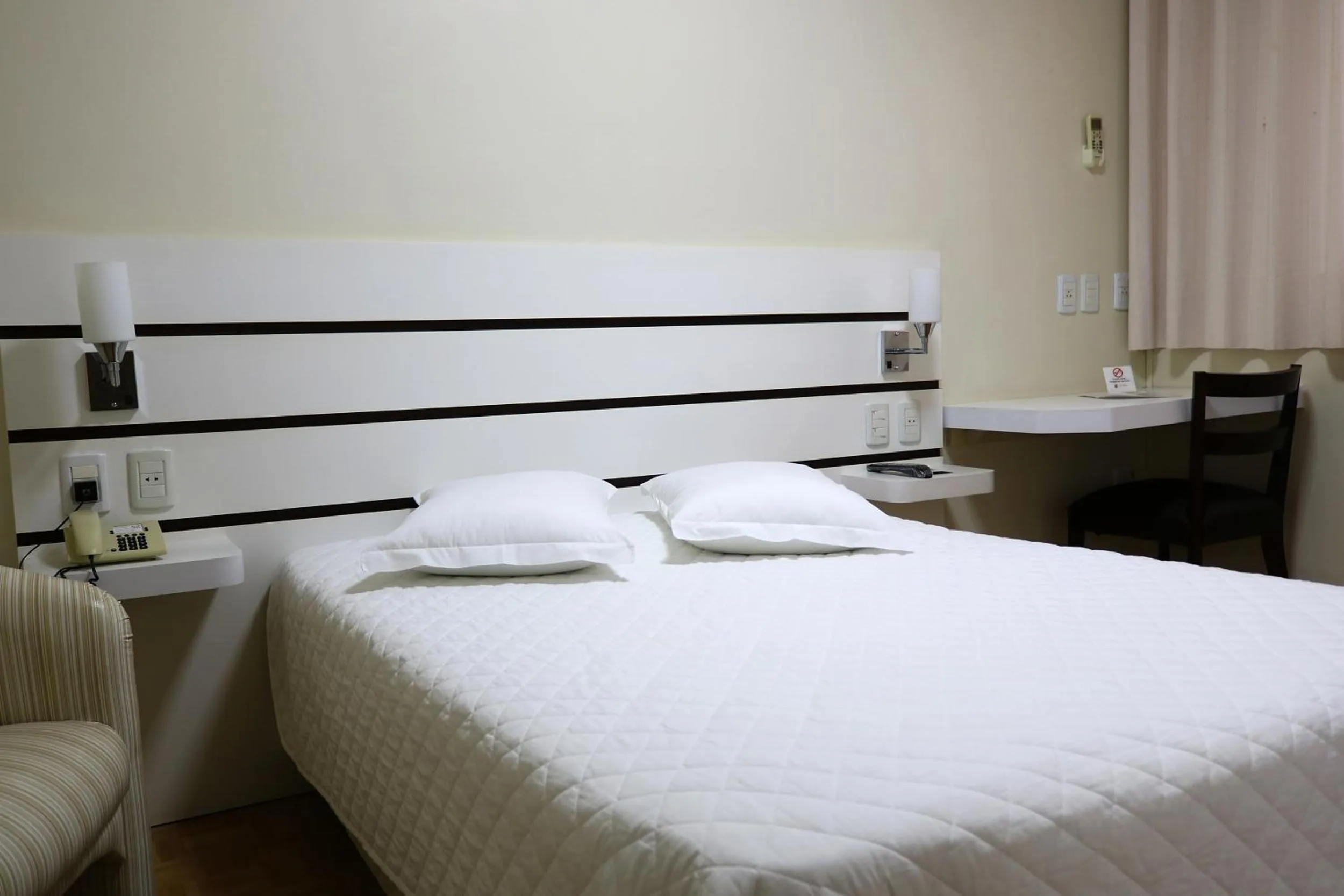 Bed in Tri Hotel Xanxerê