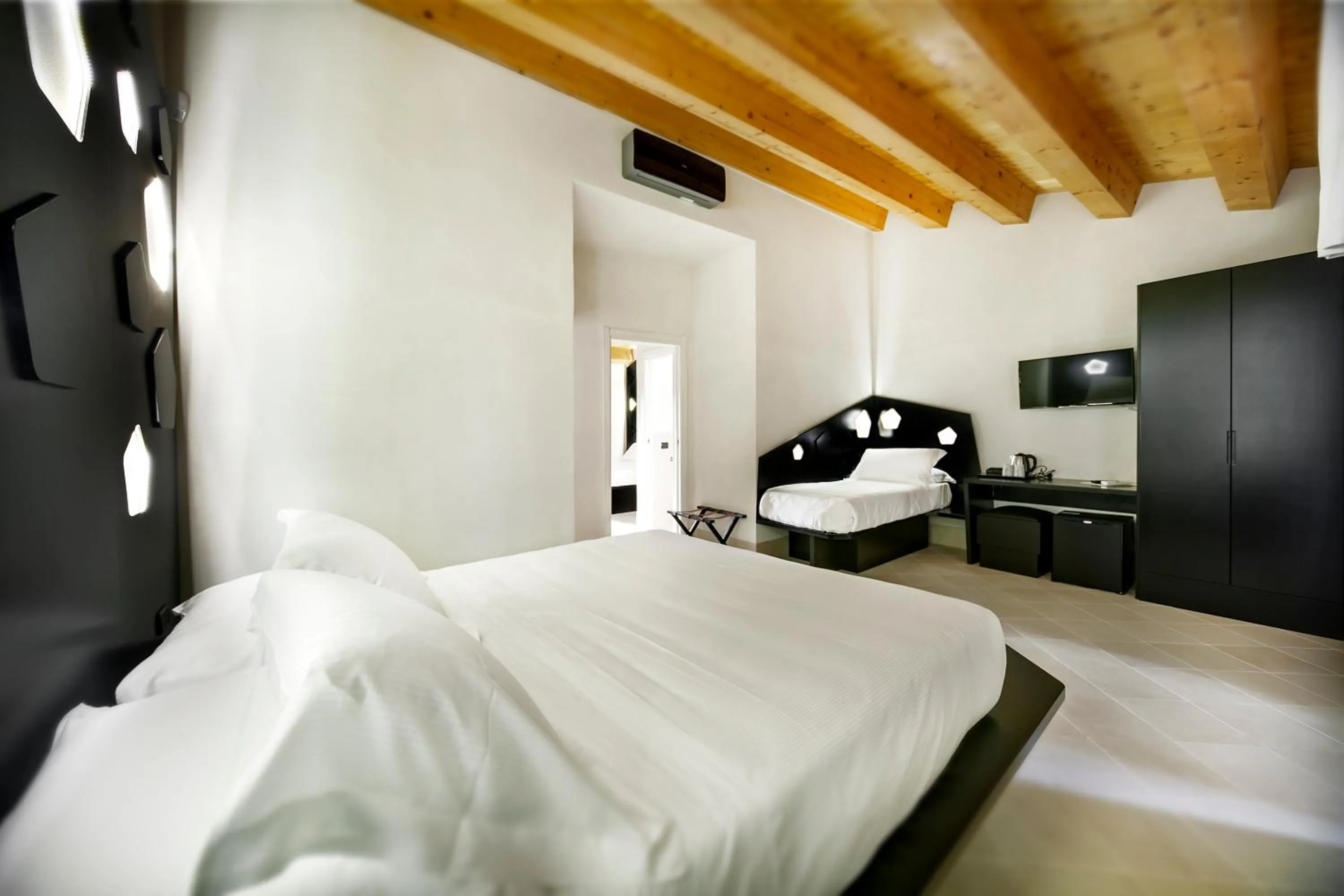 Photo of the whole room, Bed in Addauro Resort