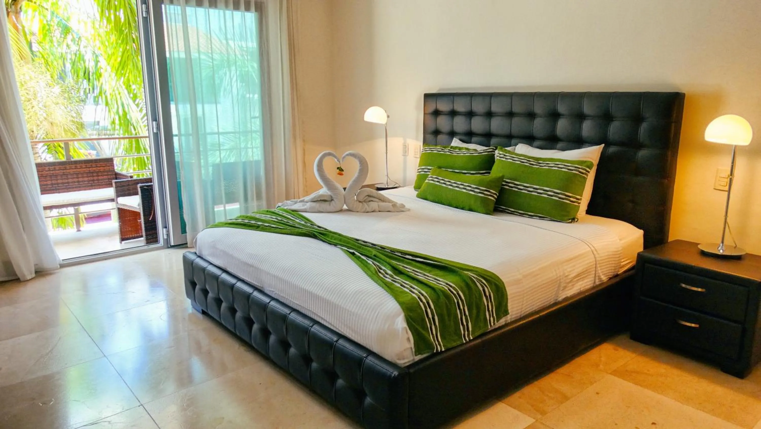 Bed in Luxurious & Central Condo In Playa Steps From The Beach