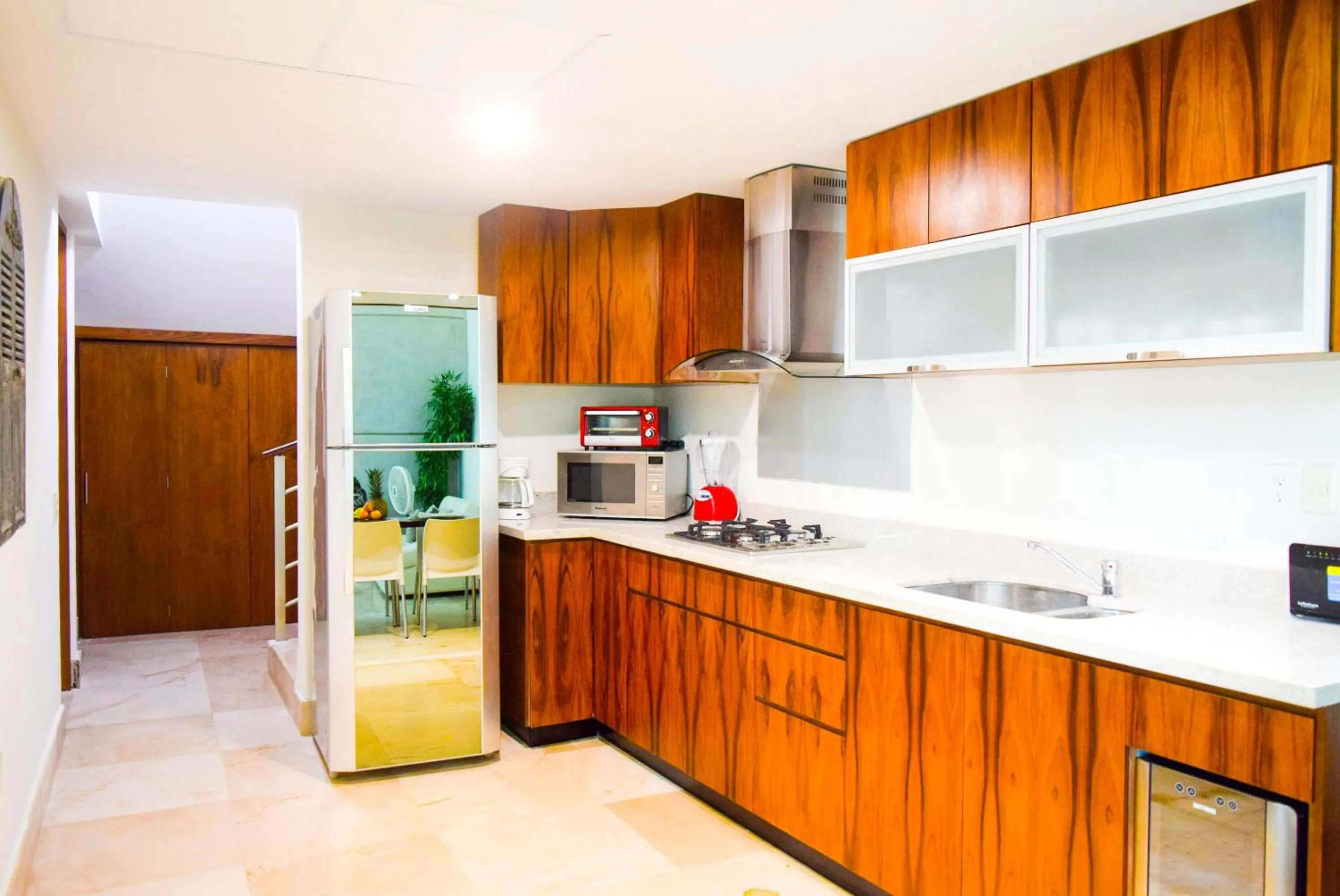 Kitchen or kitchenette in Luxurious & Central Condo In Playa Steps From The Beach