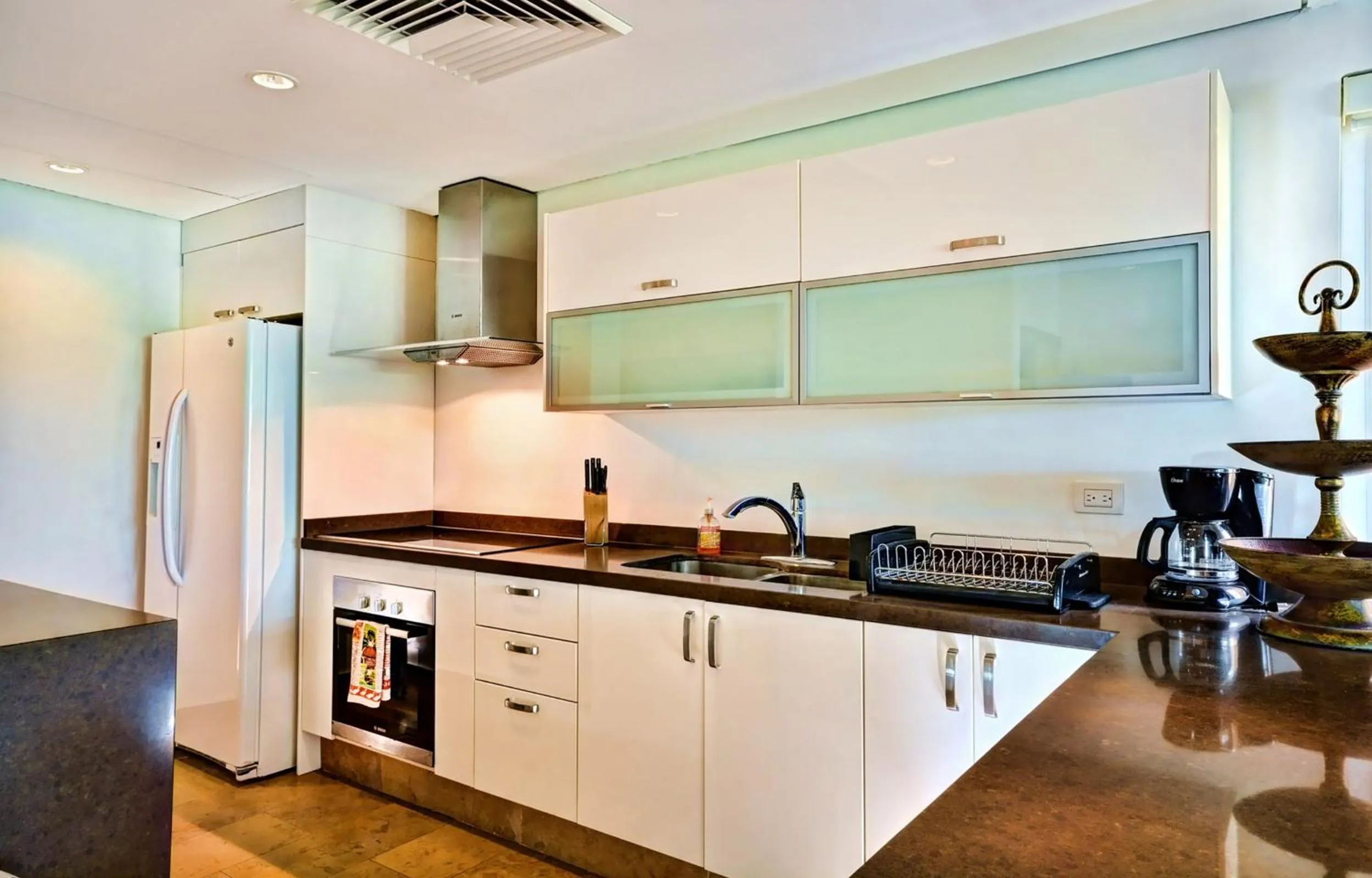 Kitchen or kitchenette in Luxurious & Central Condo In Playa Steps From The Beach