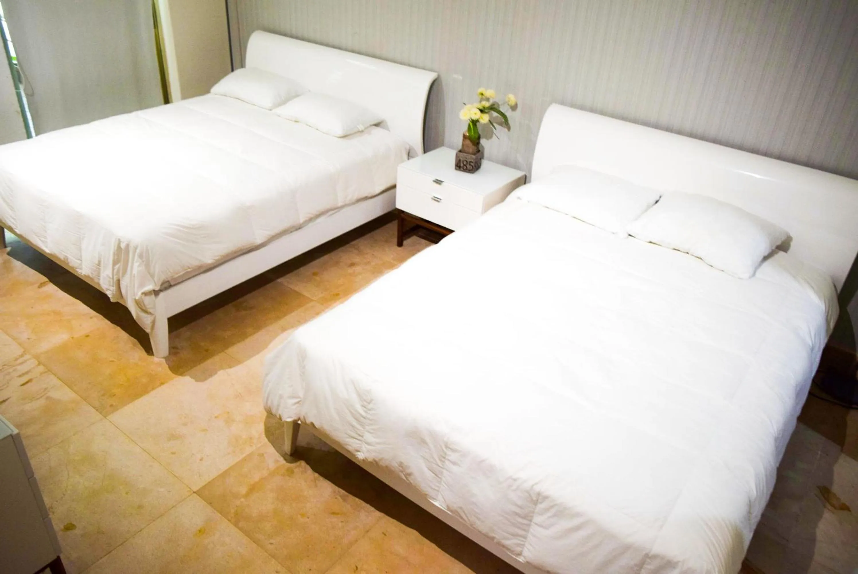 Bed in Luxurious & Central Condo In Playa Steps From The Beach