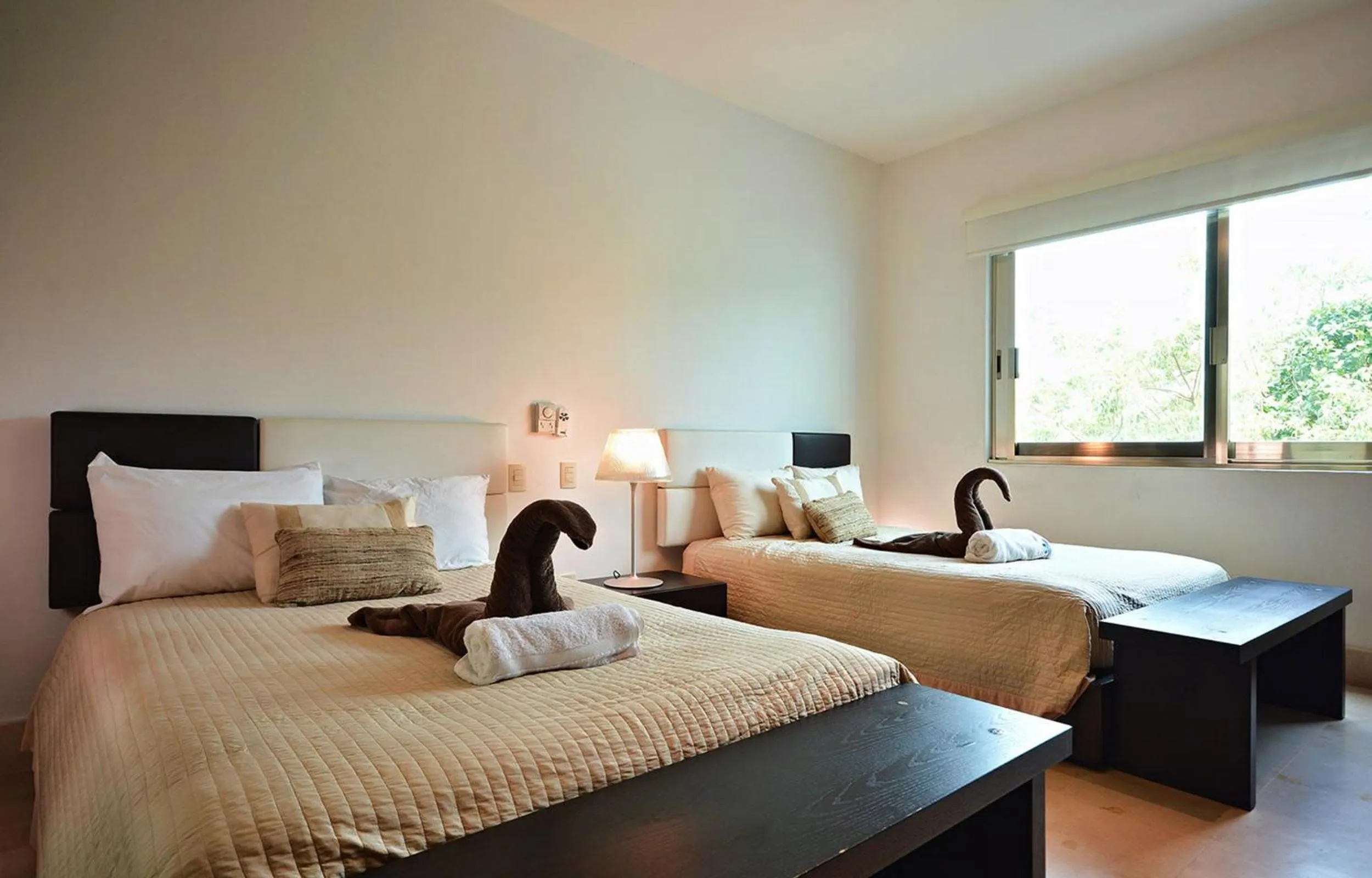 Bedroom, Bed in Luxurious & Central Condo In Playa Steps From The Beach