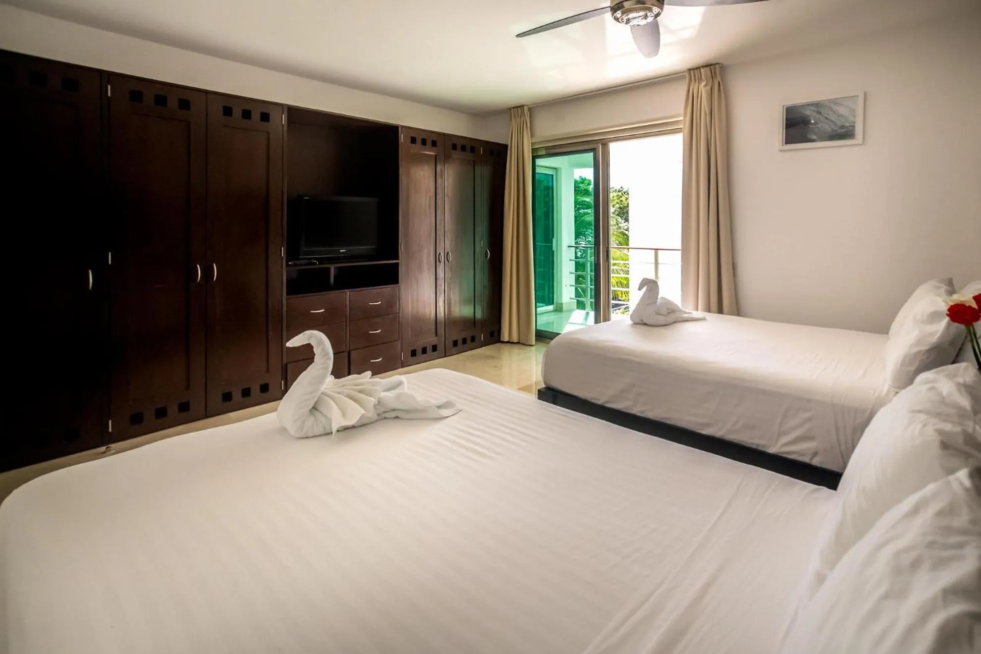 Bed in Luxurious & Central Condo In Playa Steps From The Beach