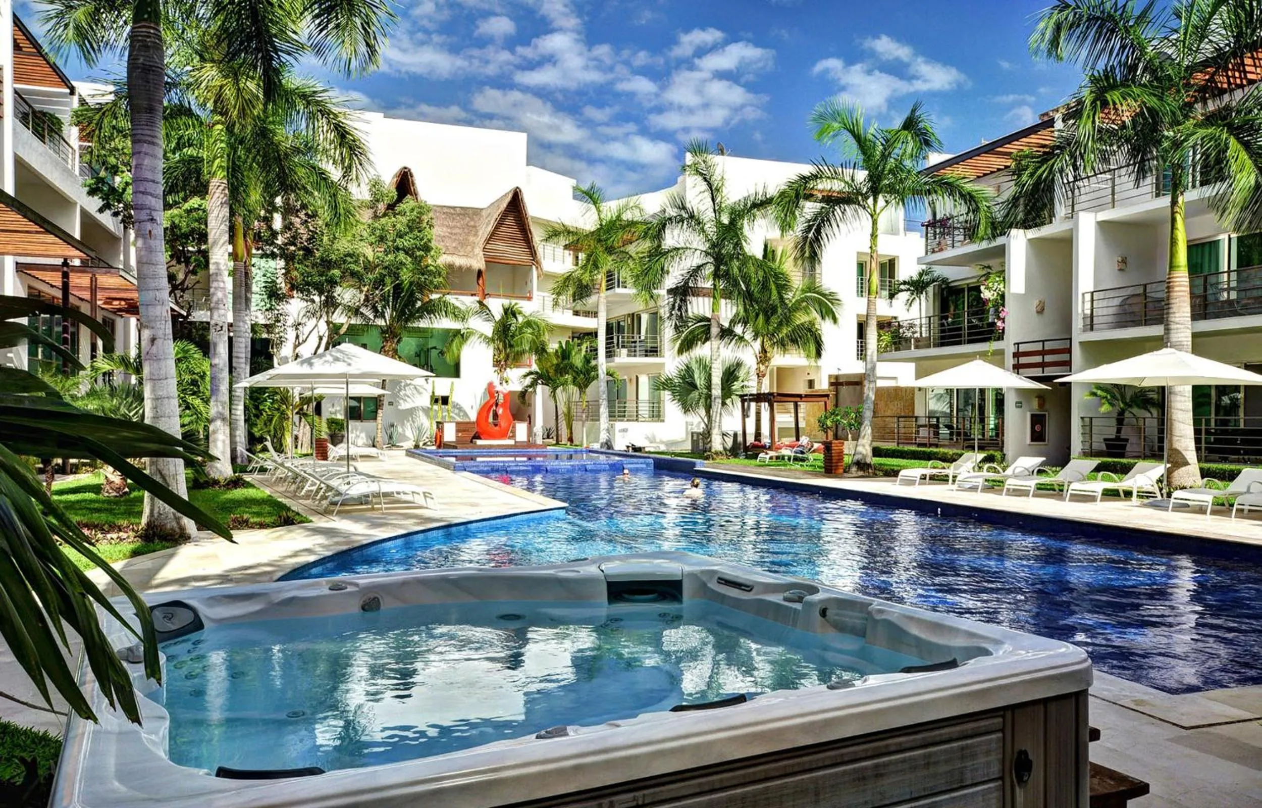 Property building in Luxurious & Central Condo In Playa Steps From The Beach