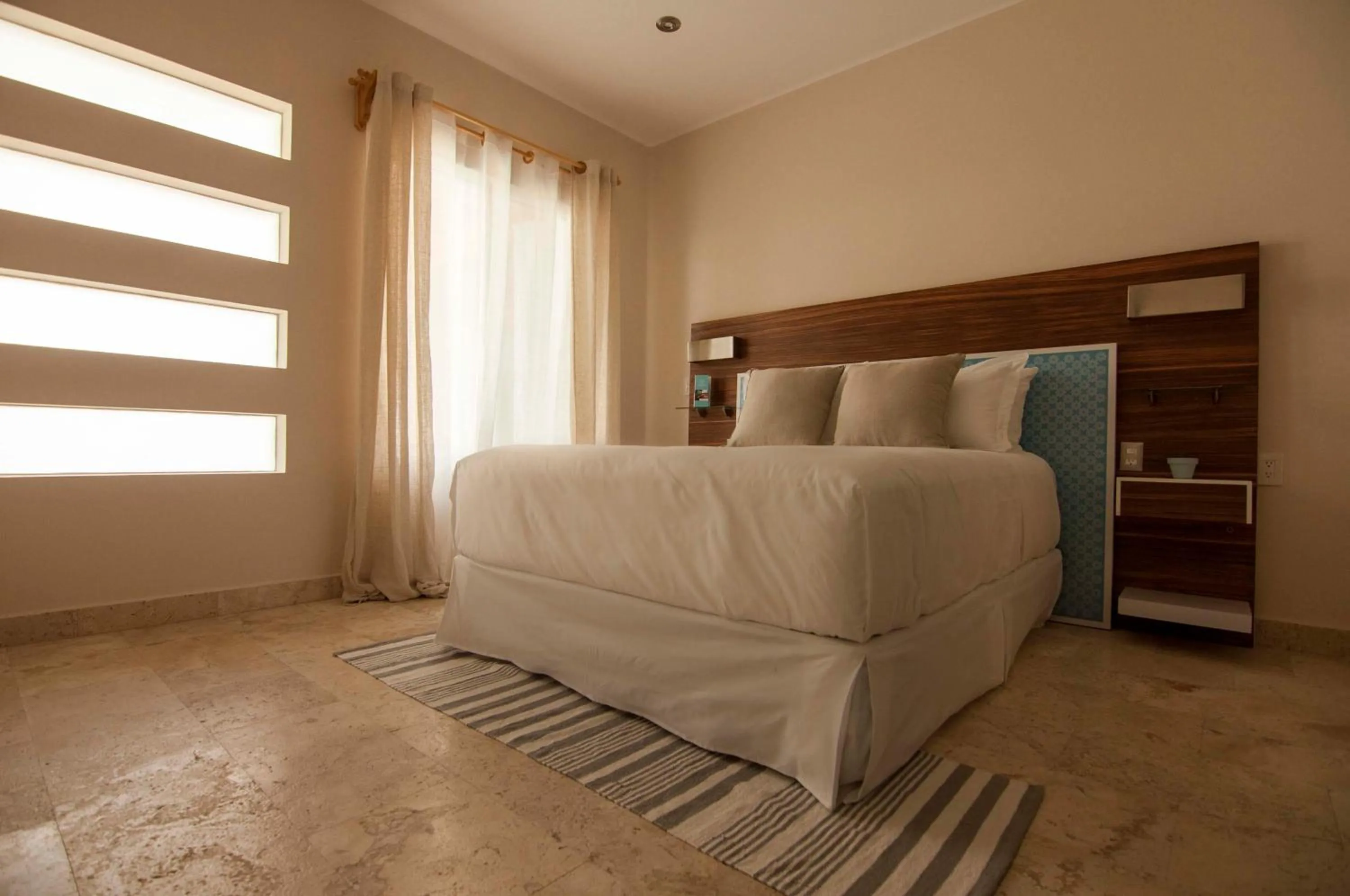 Bed in Shavanna Hotel Boutique