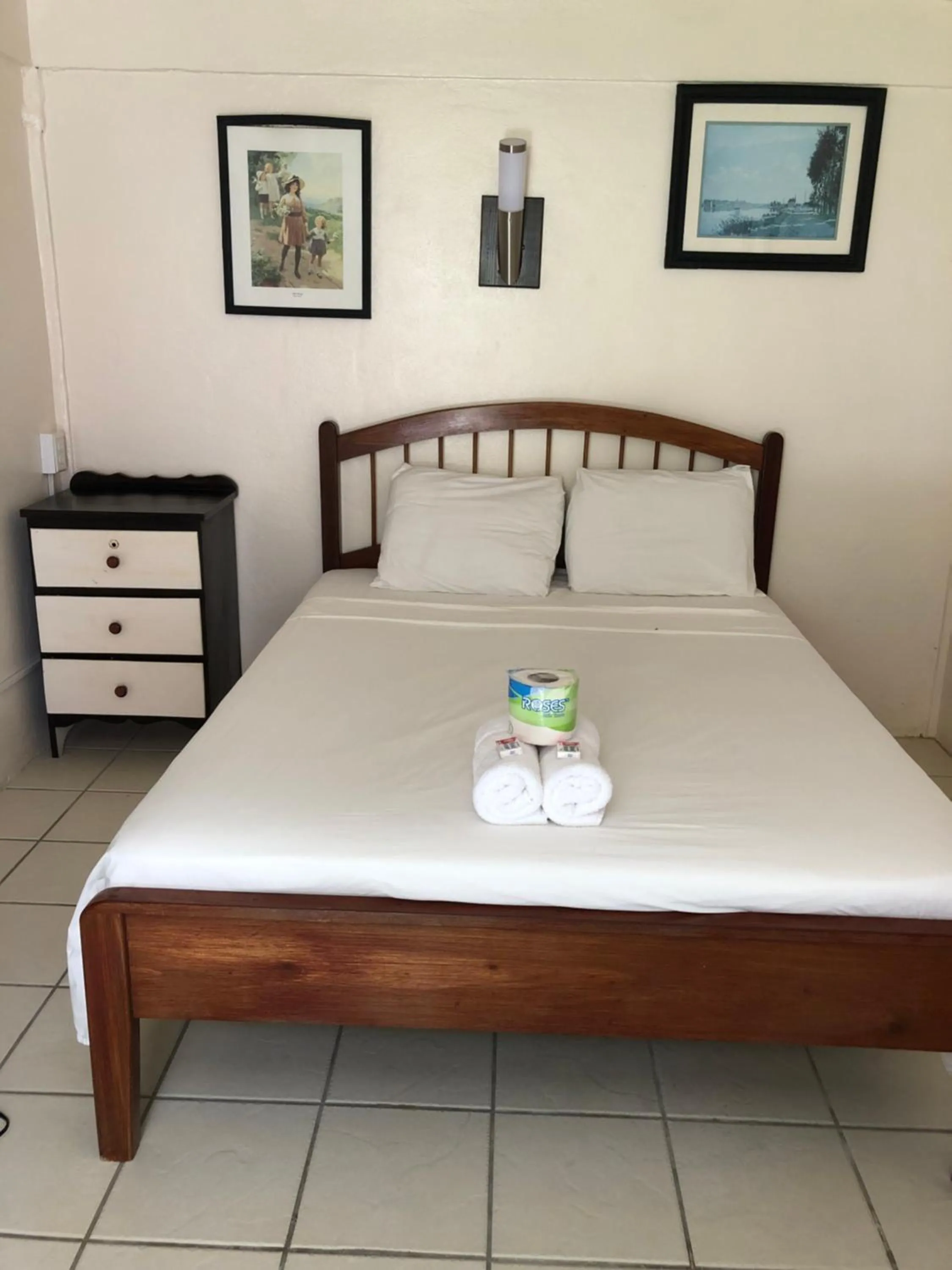 Bed in Blue Wave Guest House