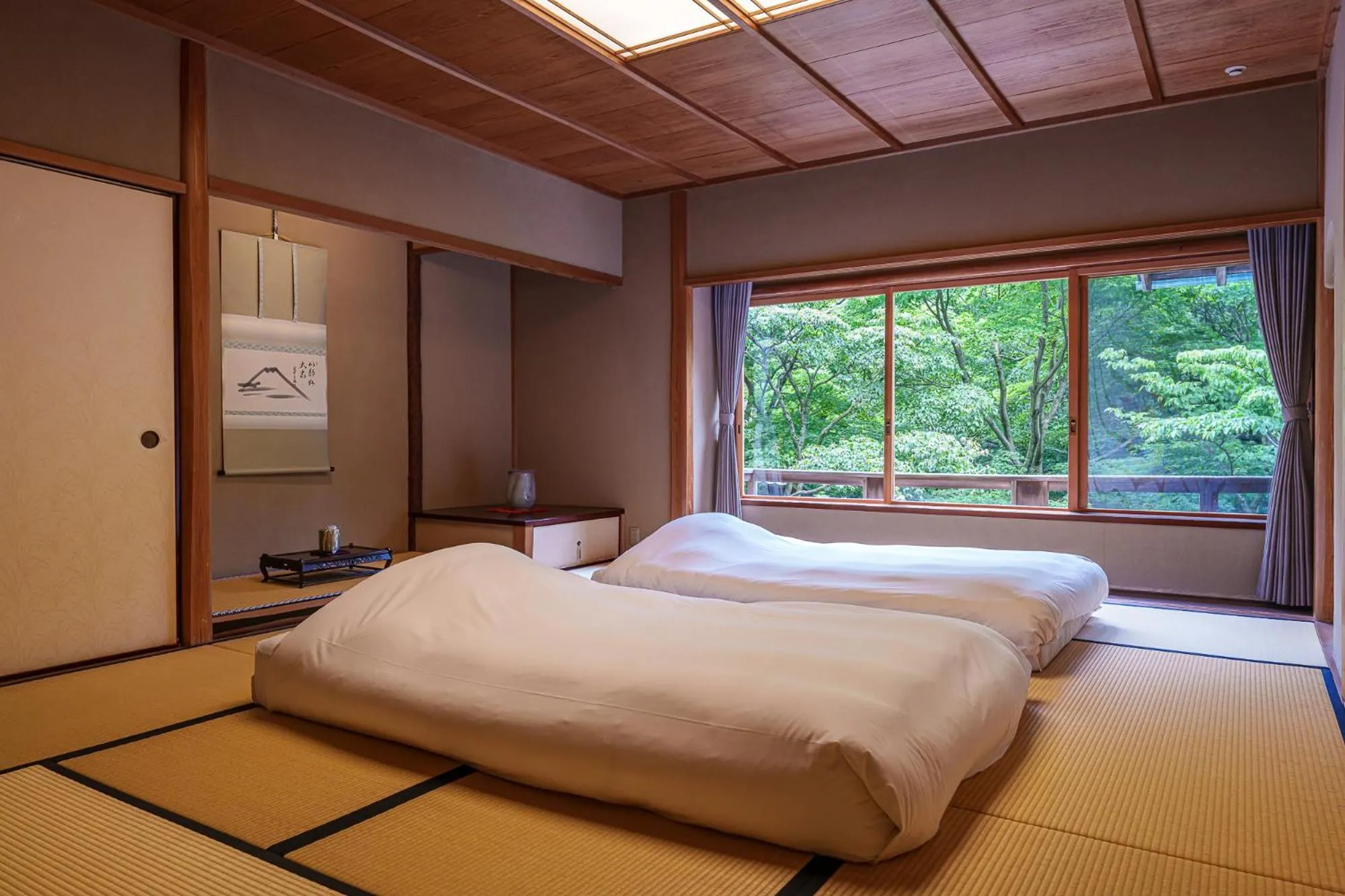 View (from property/room), Bed in UNZEN HANZUIRYO by Onko Chishin