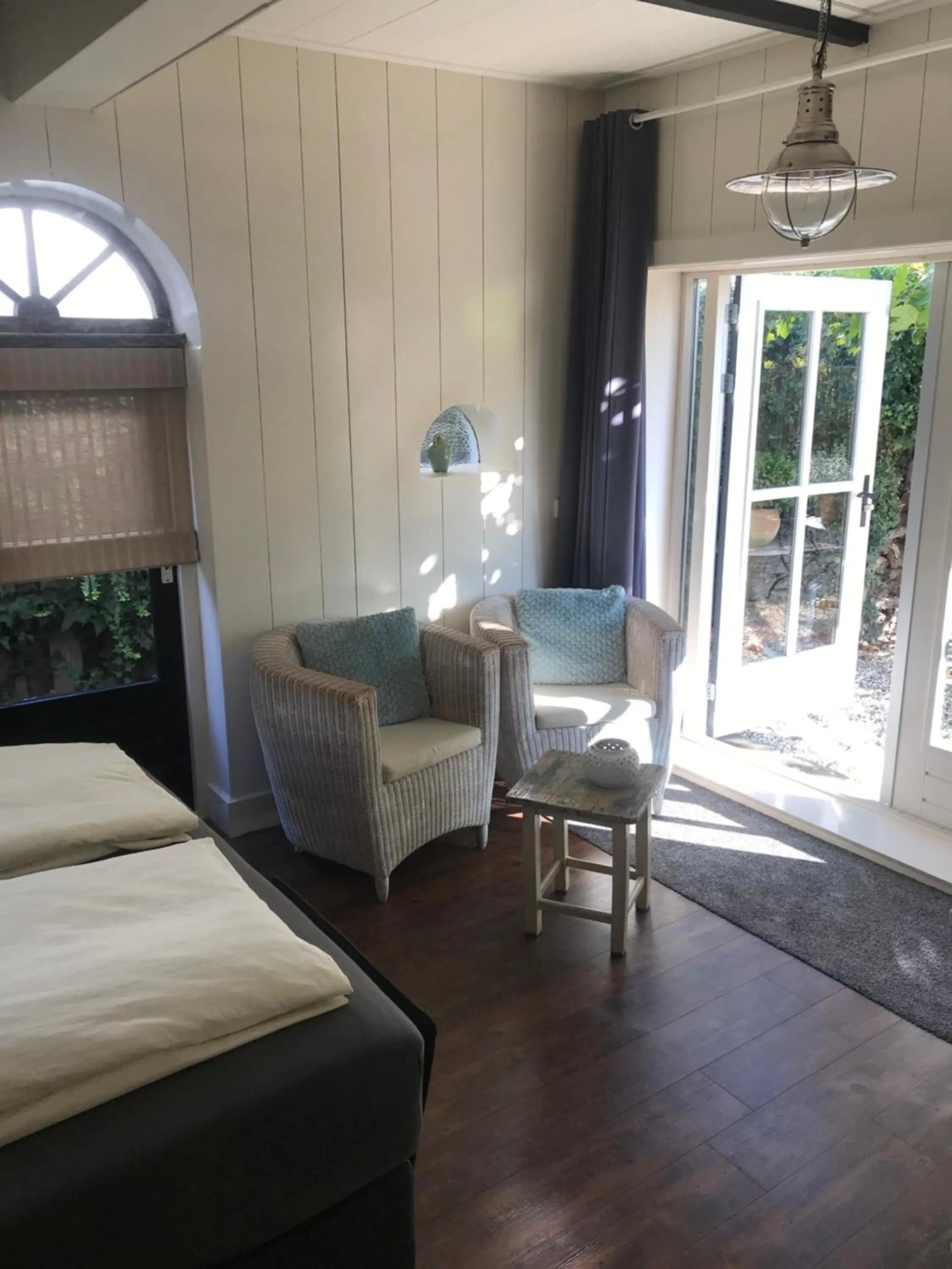 Living room, Bed in Het Koetshuis