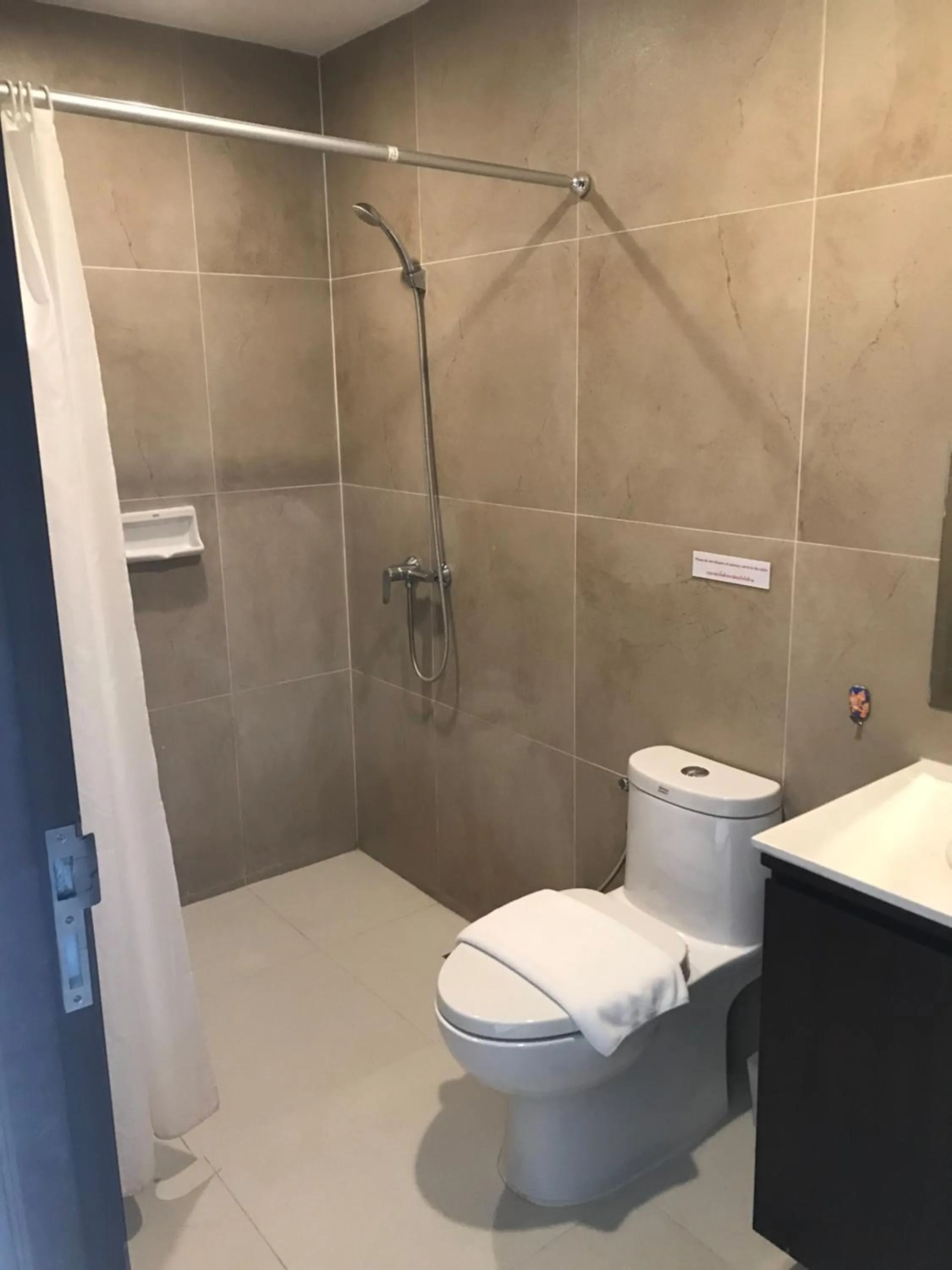 Shower in The Lai Thai Luxury Condominiums