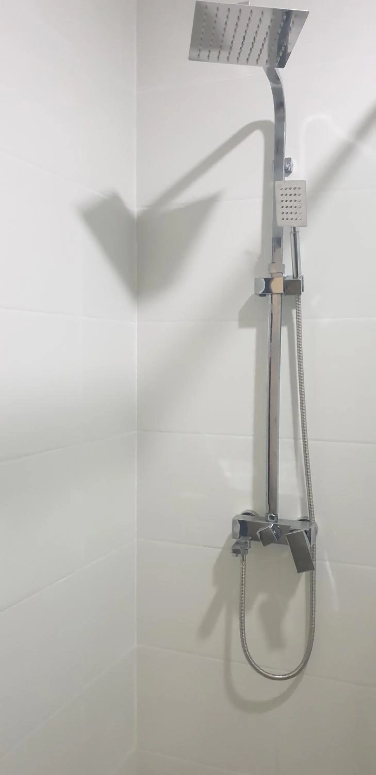 Shower in Like Family Hotel