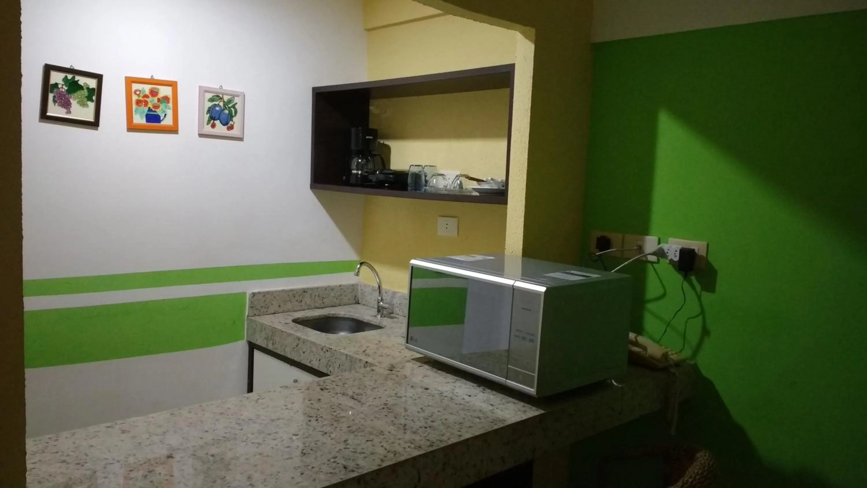 Kitchen or kitchenette in Pipa's Bay Apartamentos