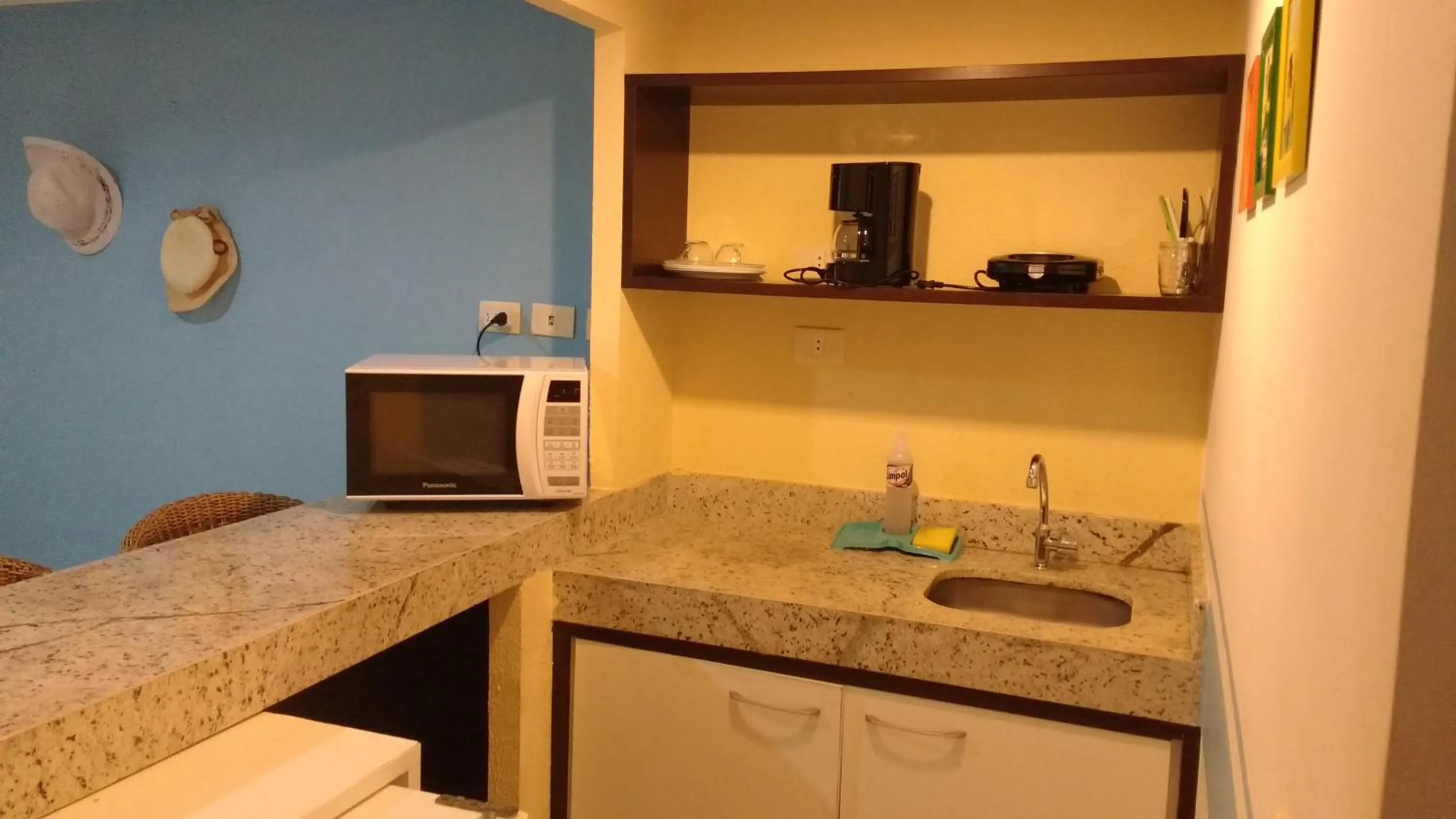 Kitchen or kitchenette in Pipa's Bay Apartamentos