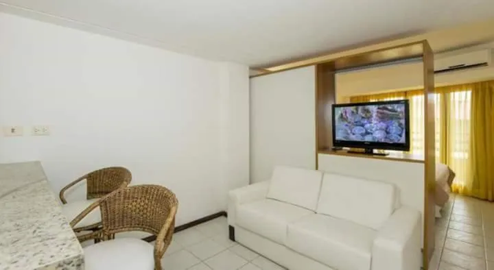 Seating area in Pipa's Bay Apartamentos