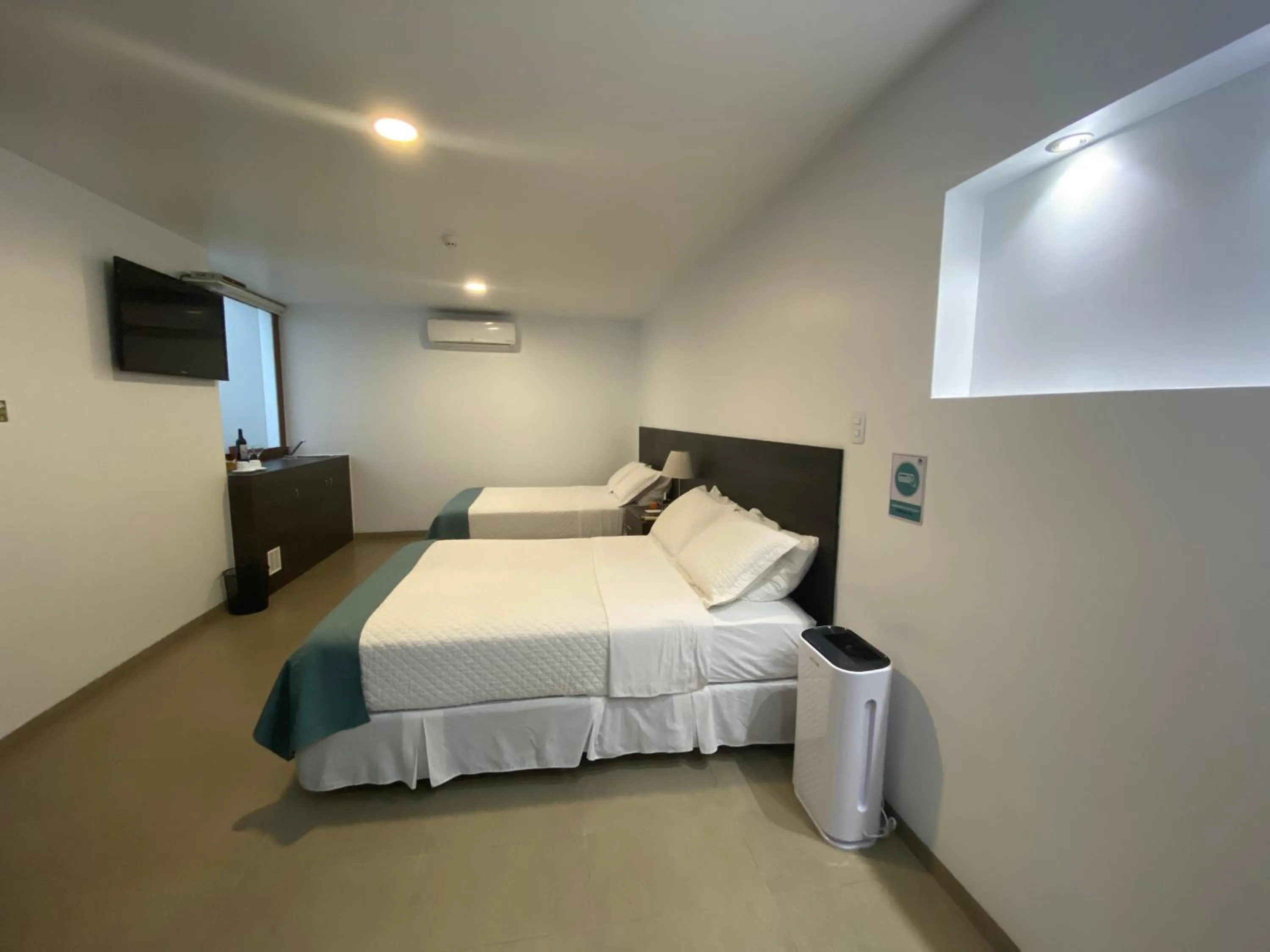 Bed in Galapagos Sunset Hotel