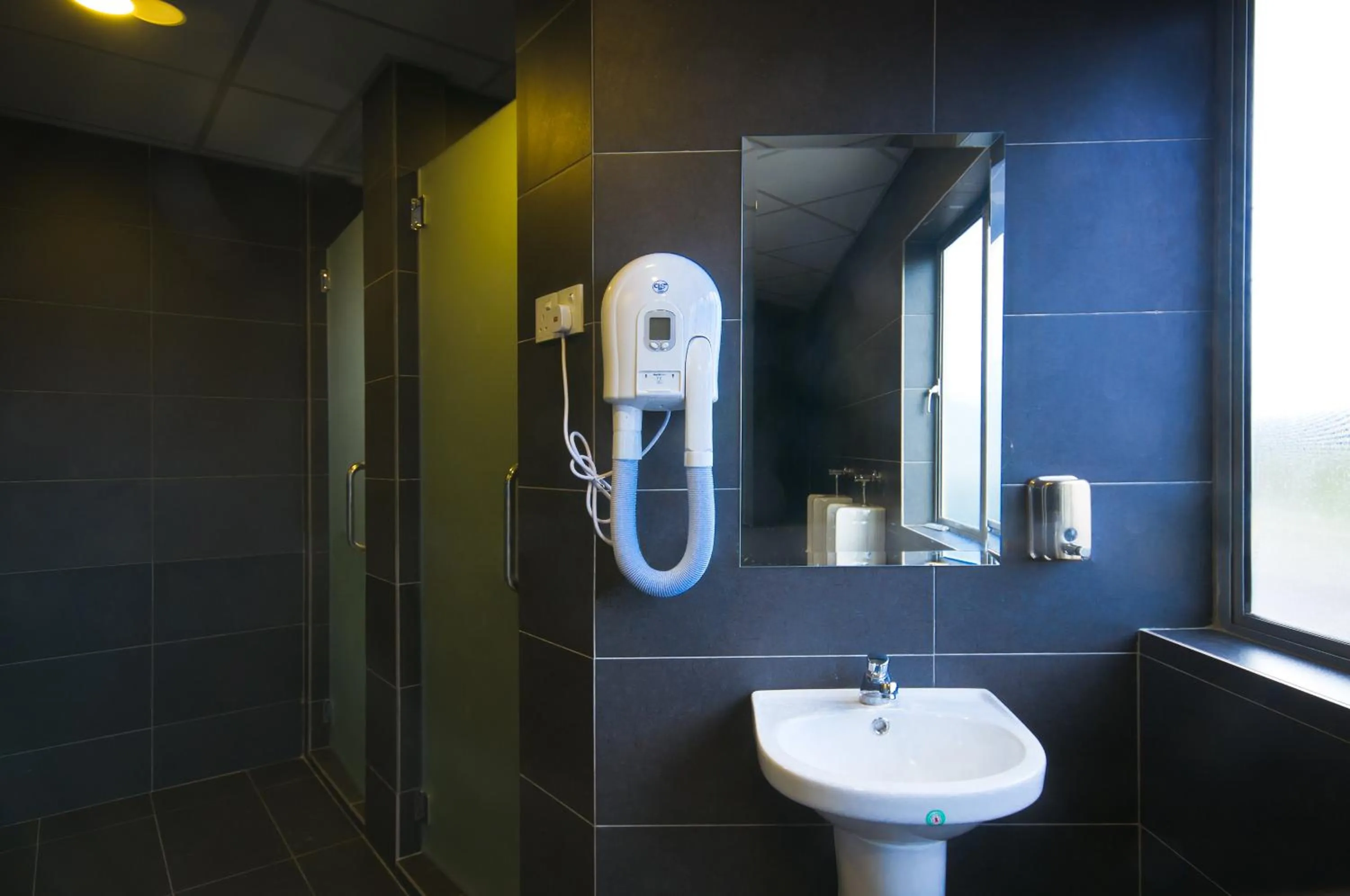 Toilet in M Qube Hotel