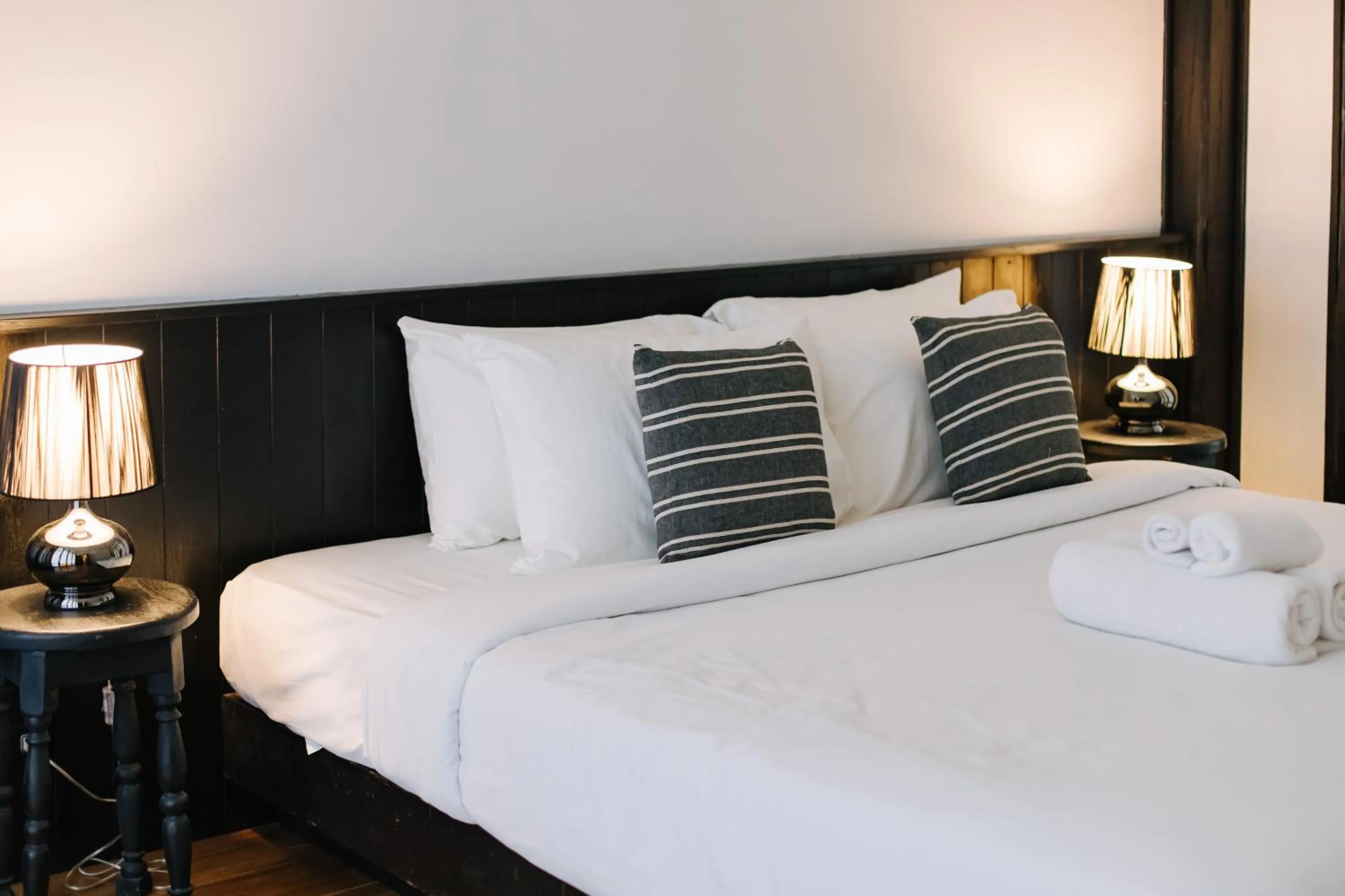 Bed in Chotana Villa Hotel Chiang Mai