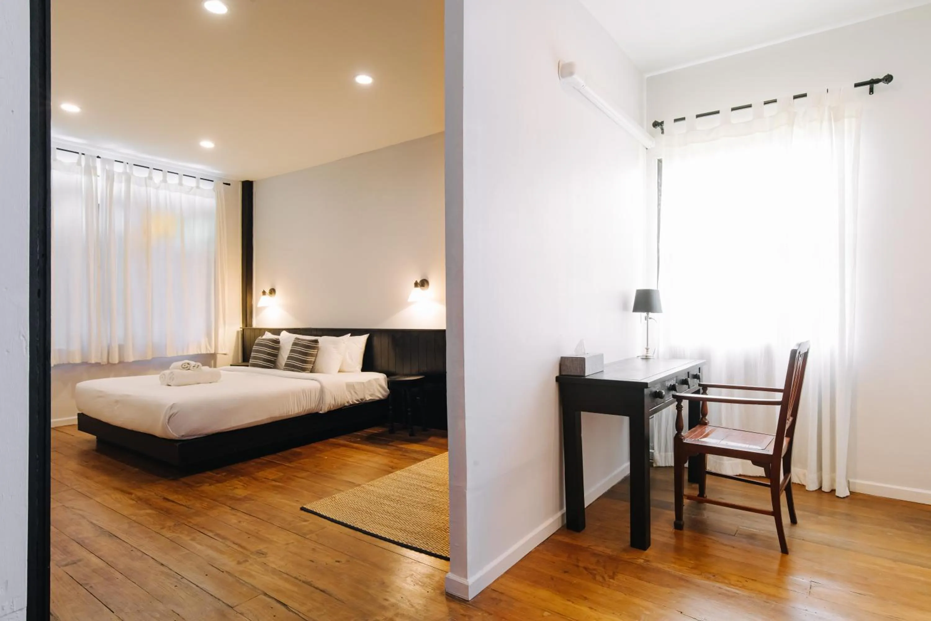 Bed in Chotana Villa Hotel Chiang Mai