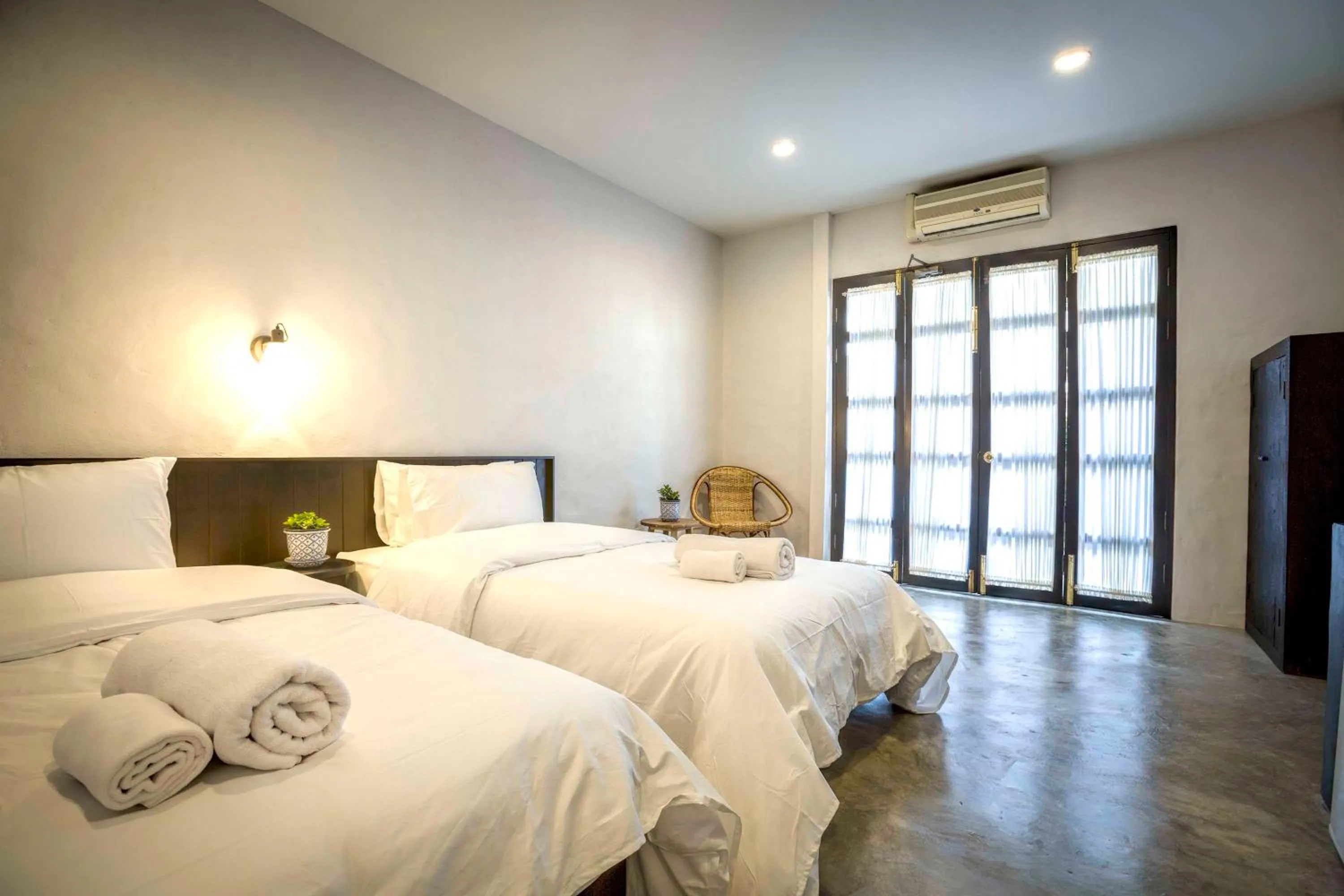 Photo of the whole room, Bed in Chotana Villa Hotel Chiang Mai