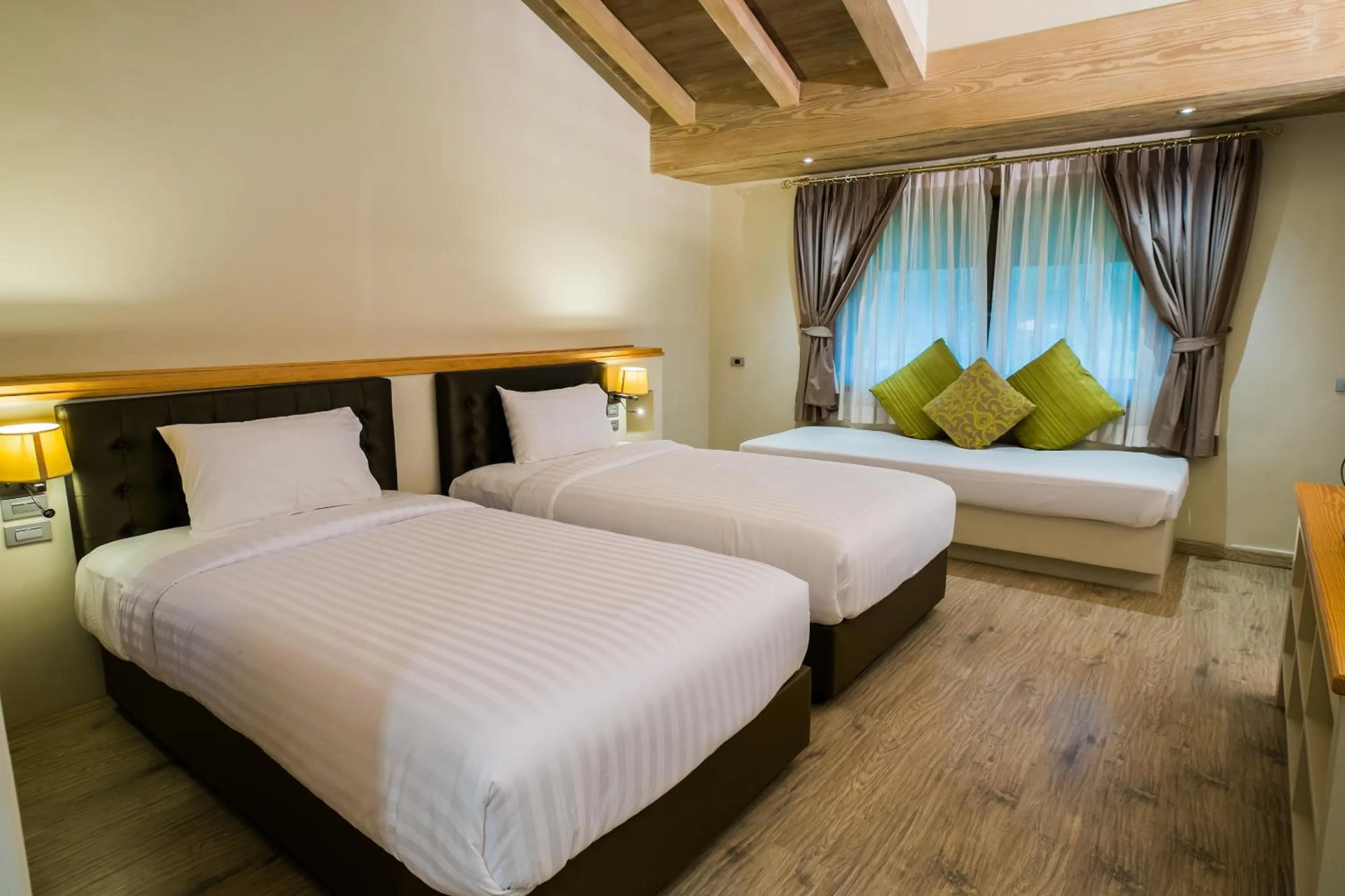 Bed in Mela Garden Retreat Cottage