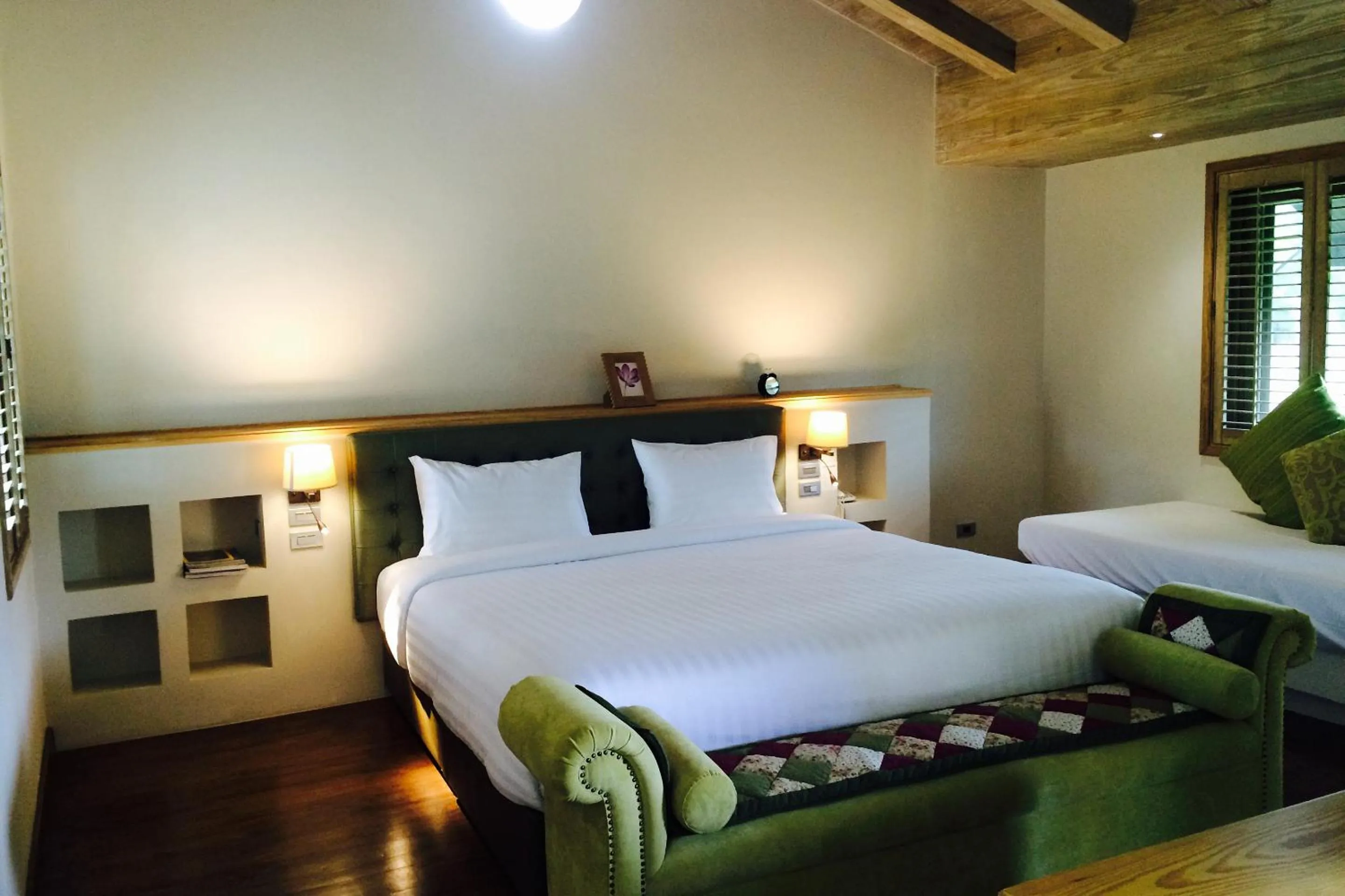 Bed in Mela Garden Retreat Cottage