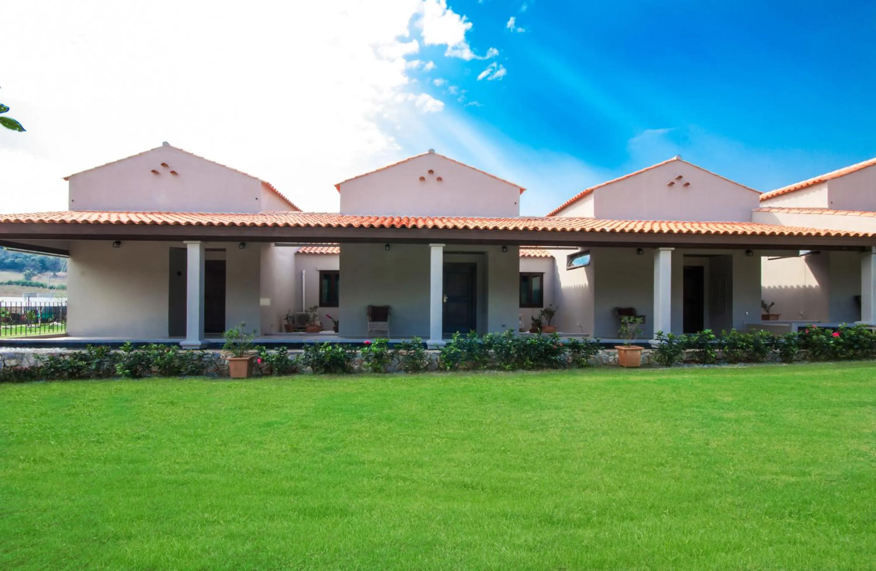 Property building in Mela Garden Retreat Cottage