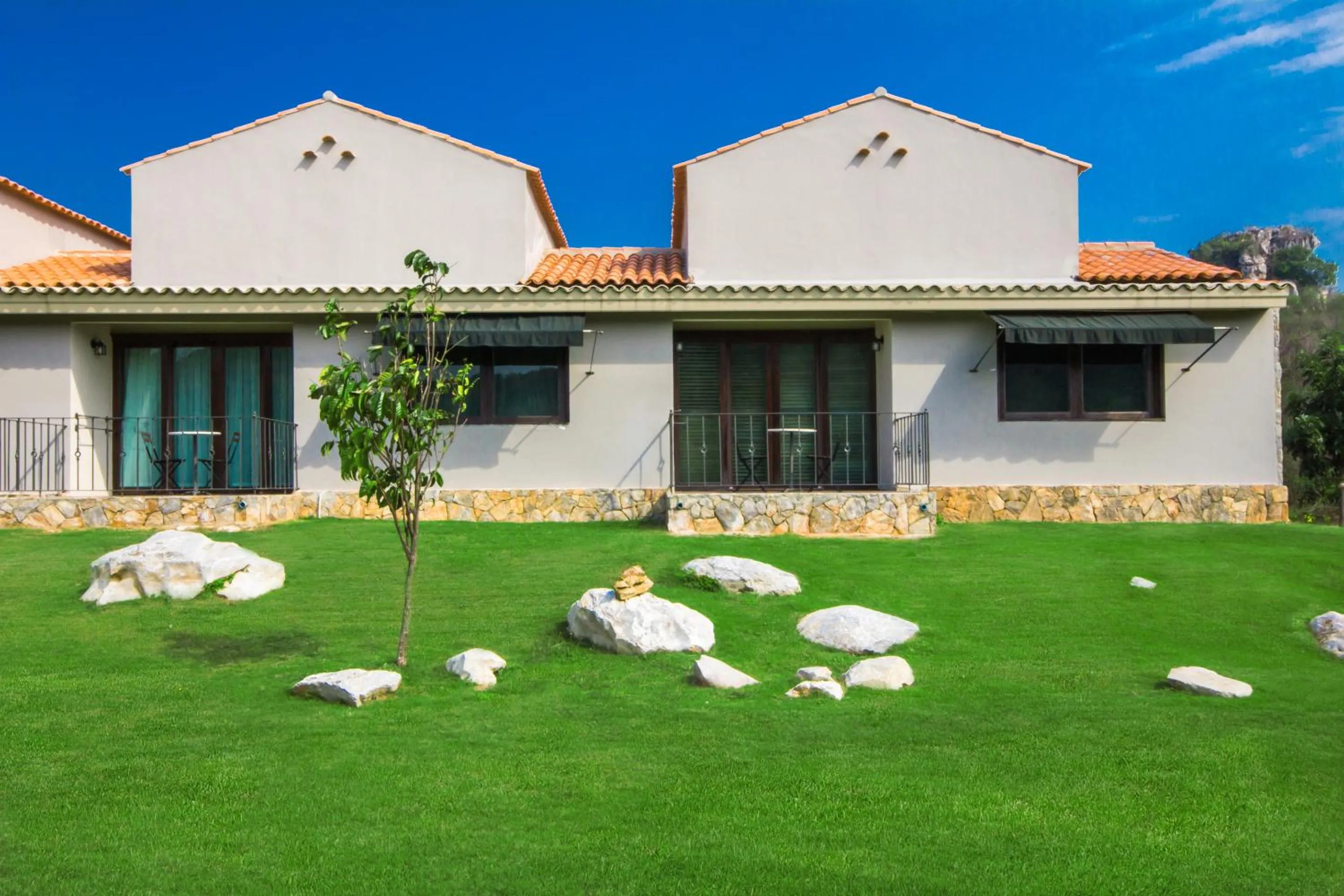 Property building in Mela Garden Retreat Cottage