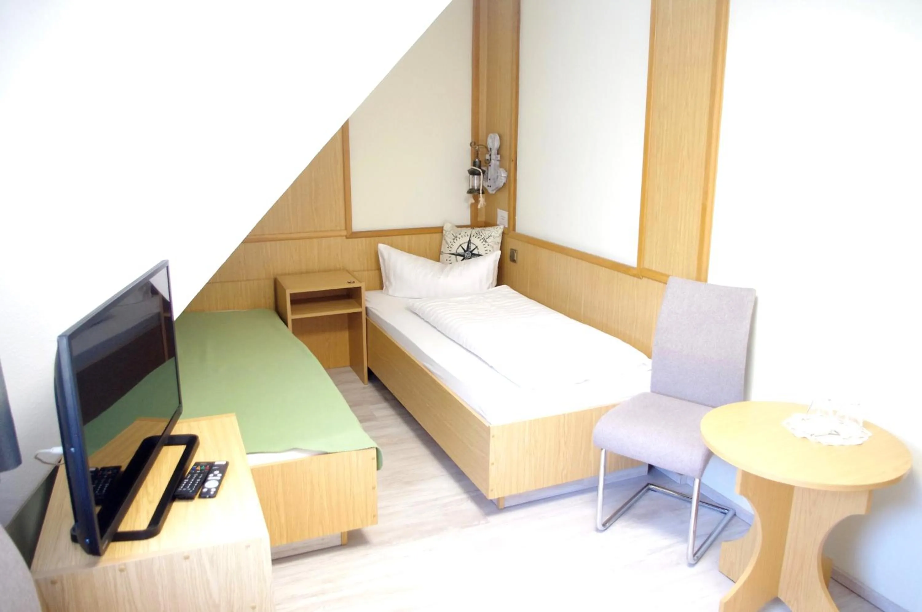 Photo of the whole room, Bed in Hotel Gasthof zum Walfisch