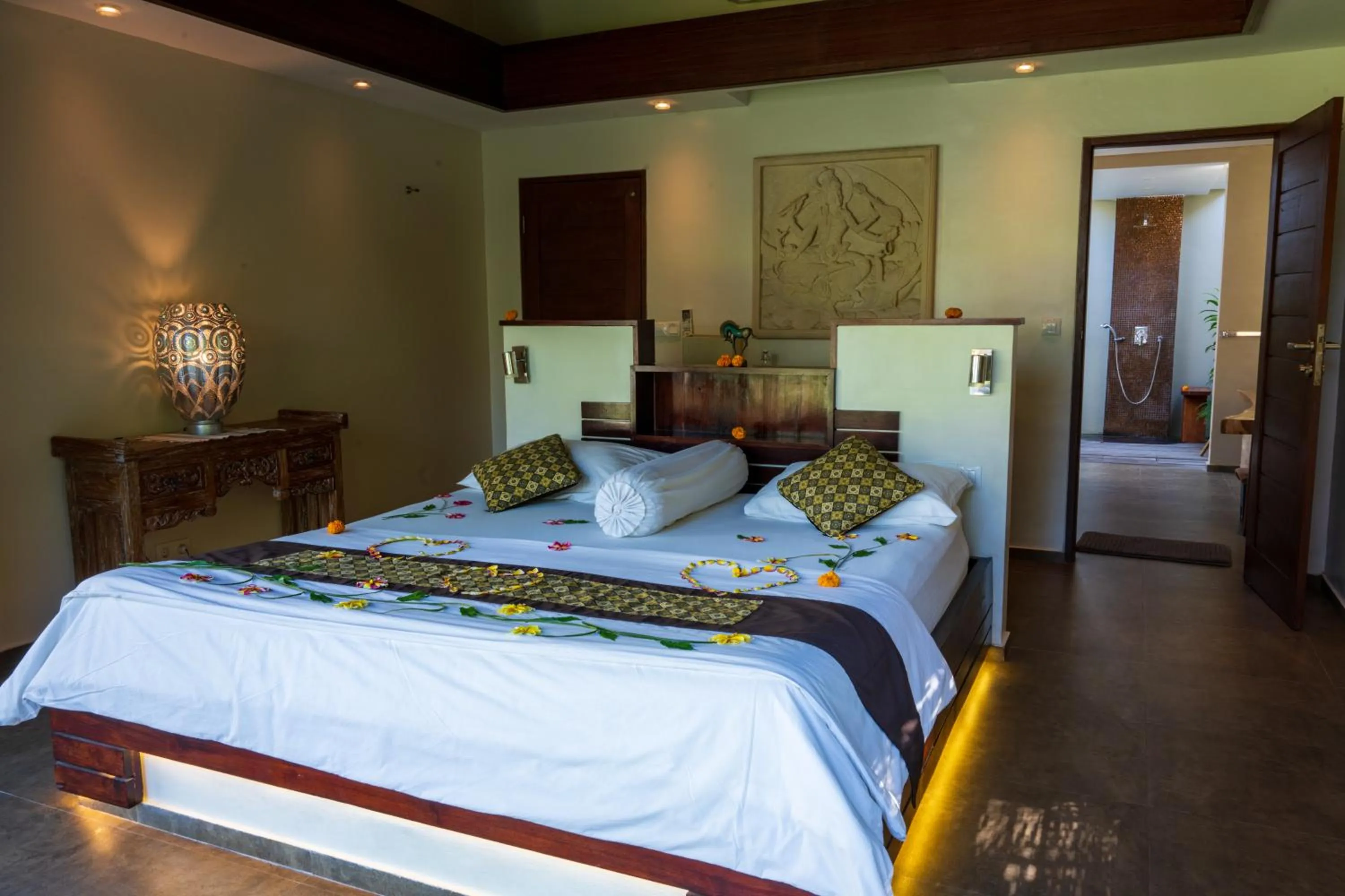 Bed in Relax Bali Dive & SPA ocean front resort