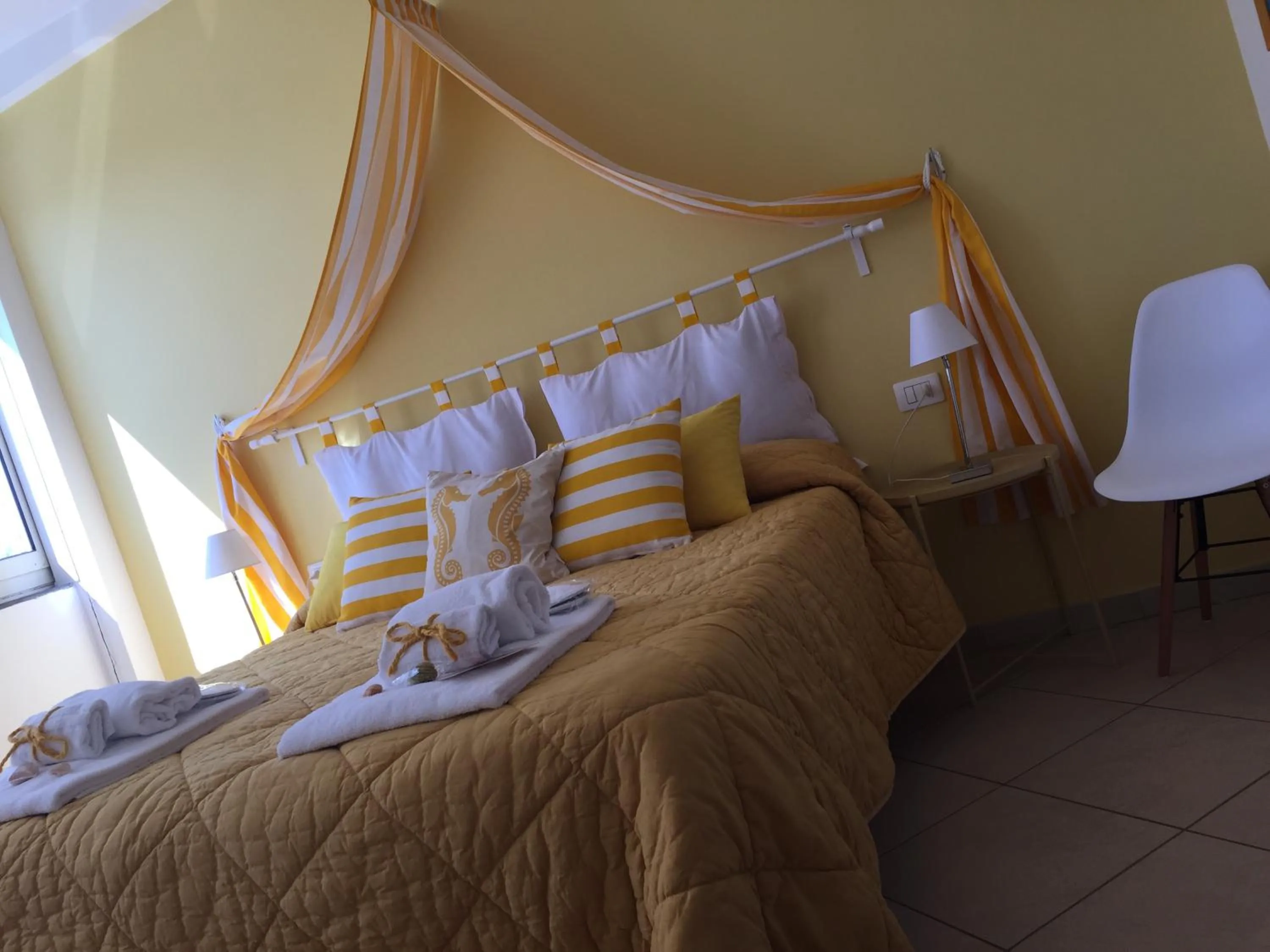 Photo of the whole room, Bed in L'Approdo