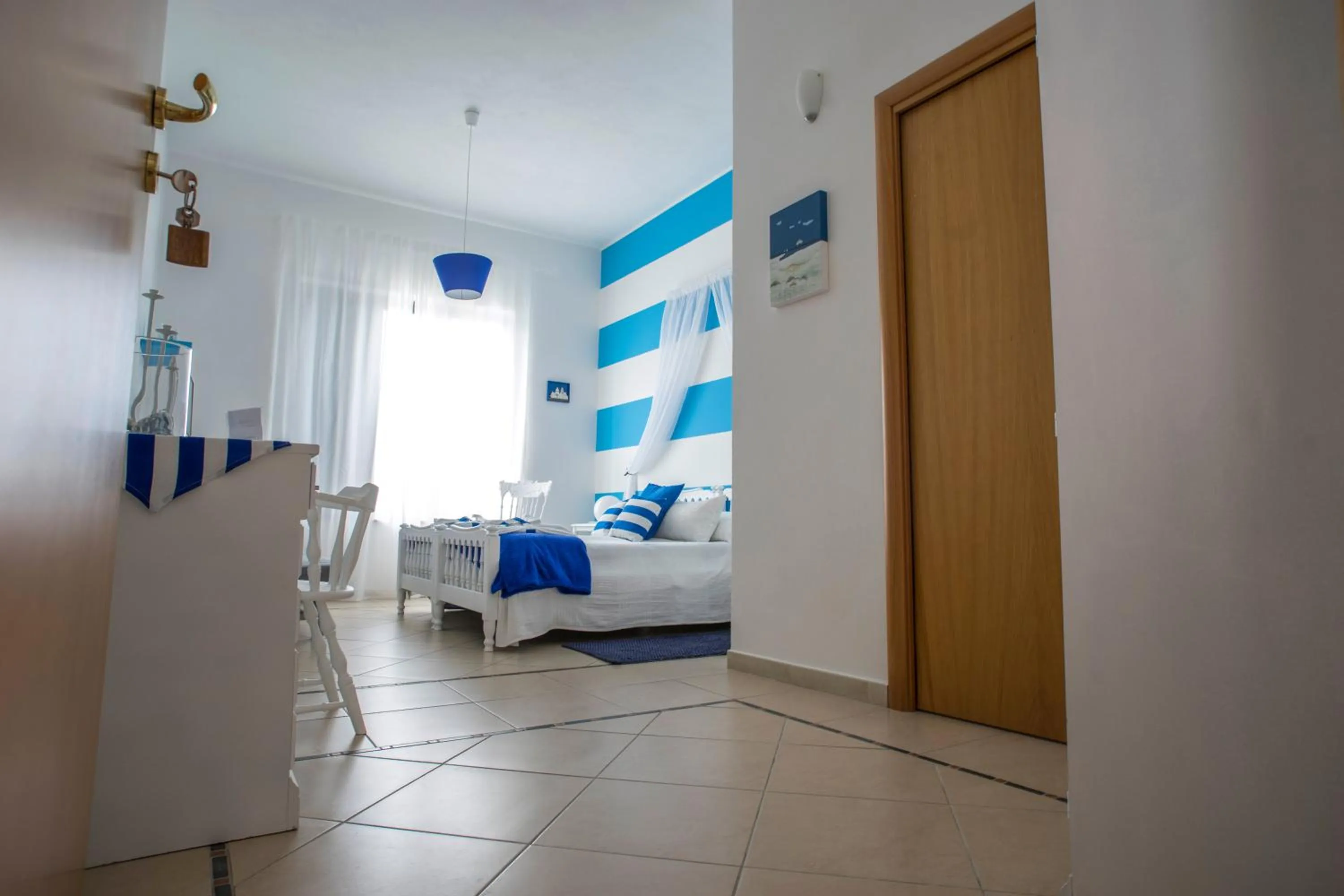 Landmark view, Bed in L'Approdo