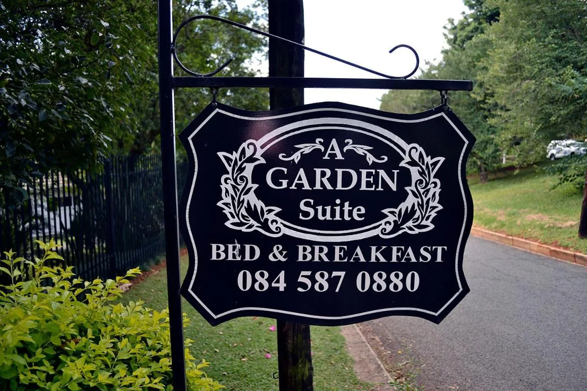 Property logo or sign in A Garden Suite B&B