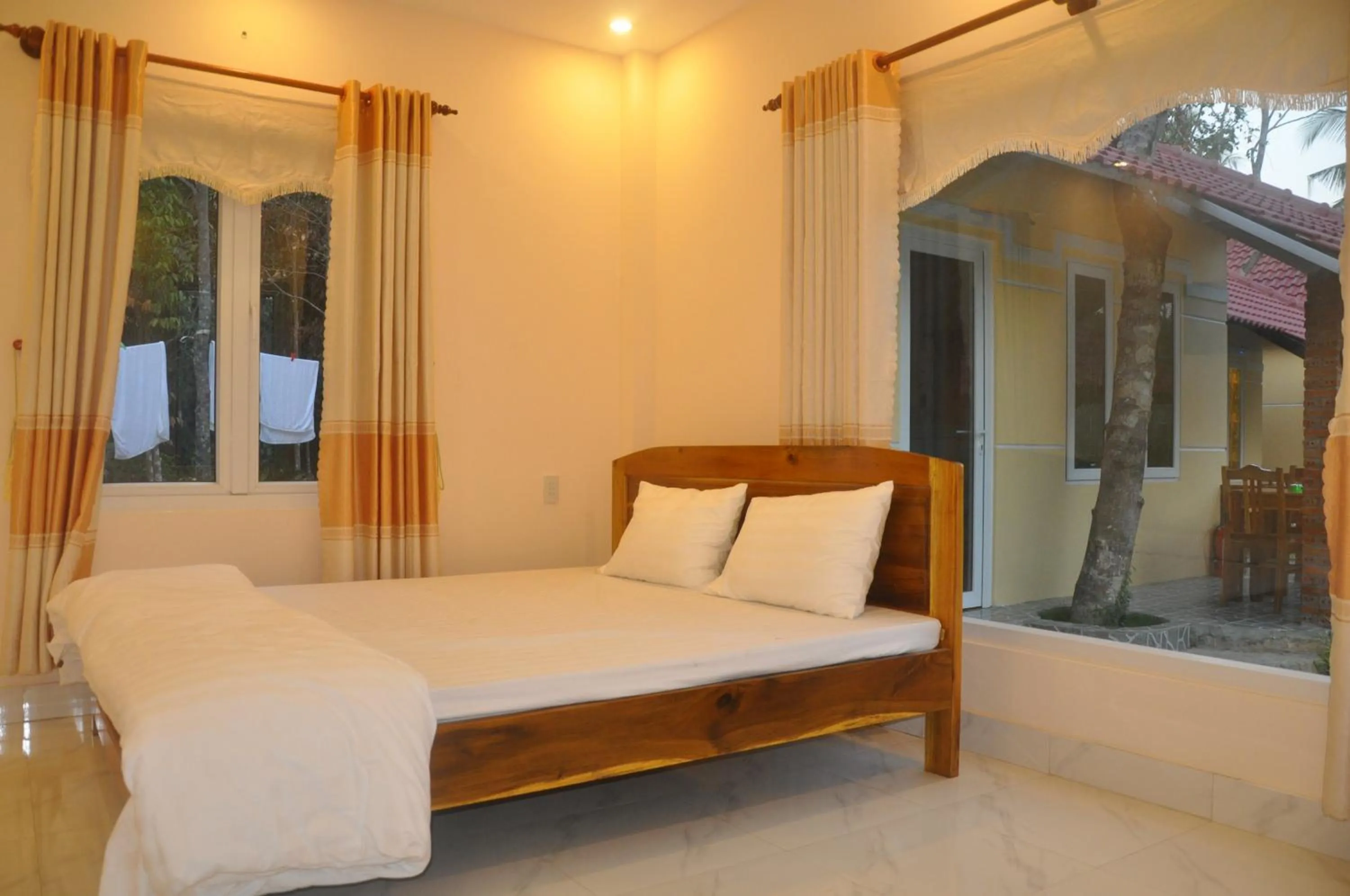 Bed in Sun & Wind Paradise Bungalow